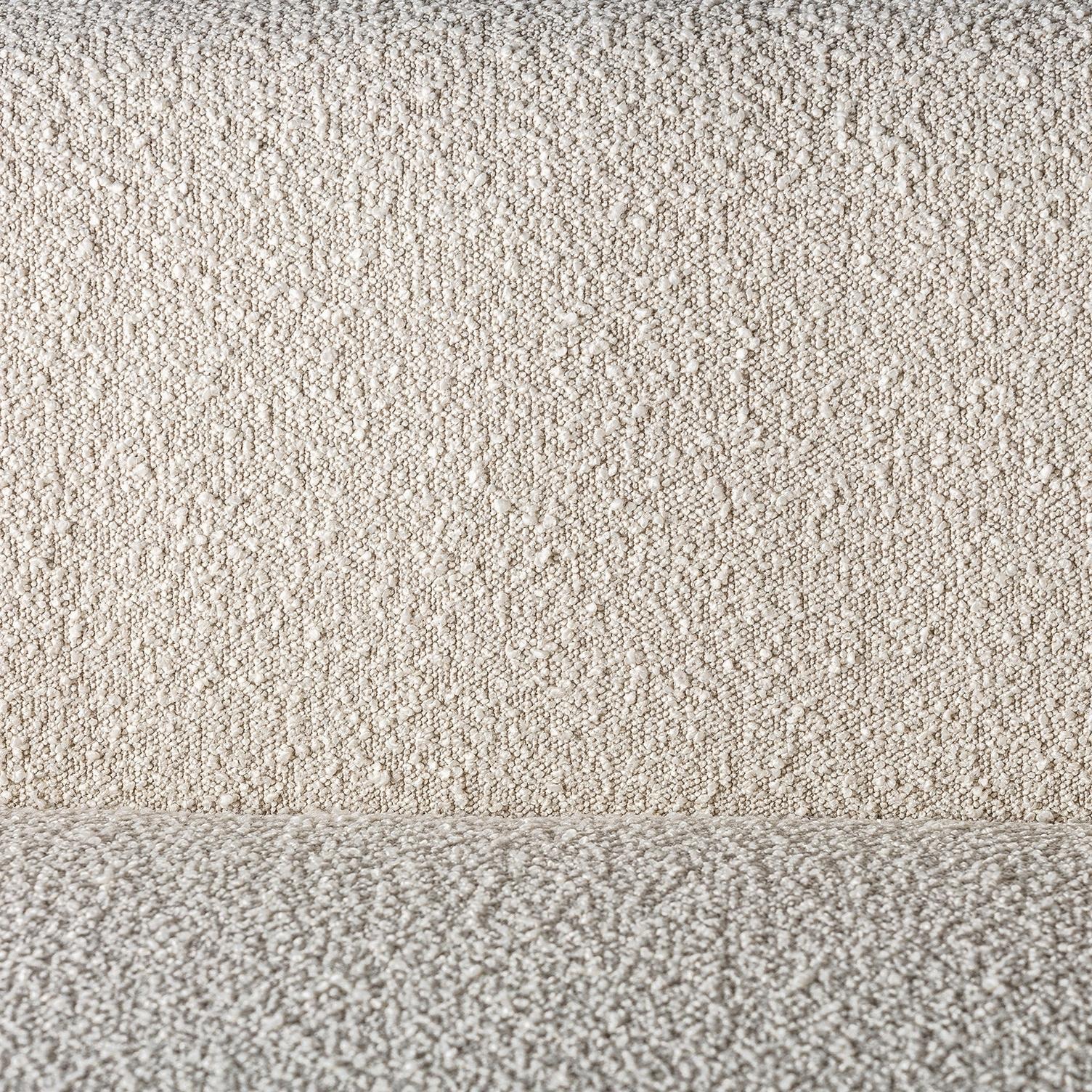 Divano in tessuto bouclé dal design vintage 1
