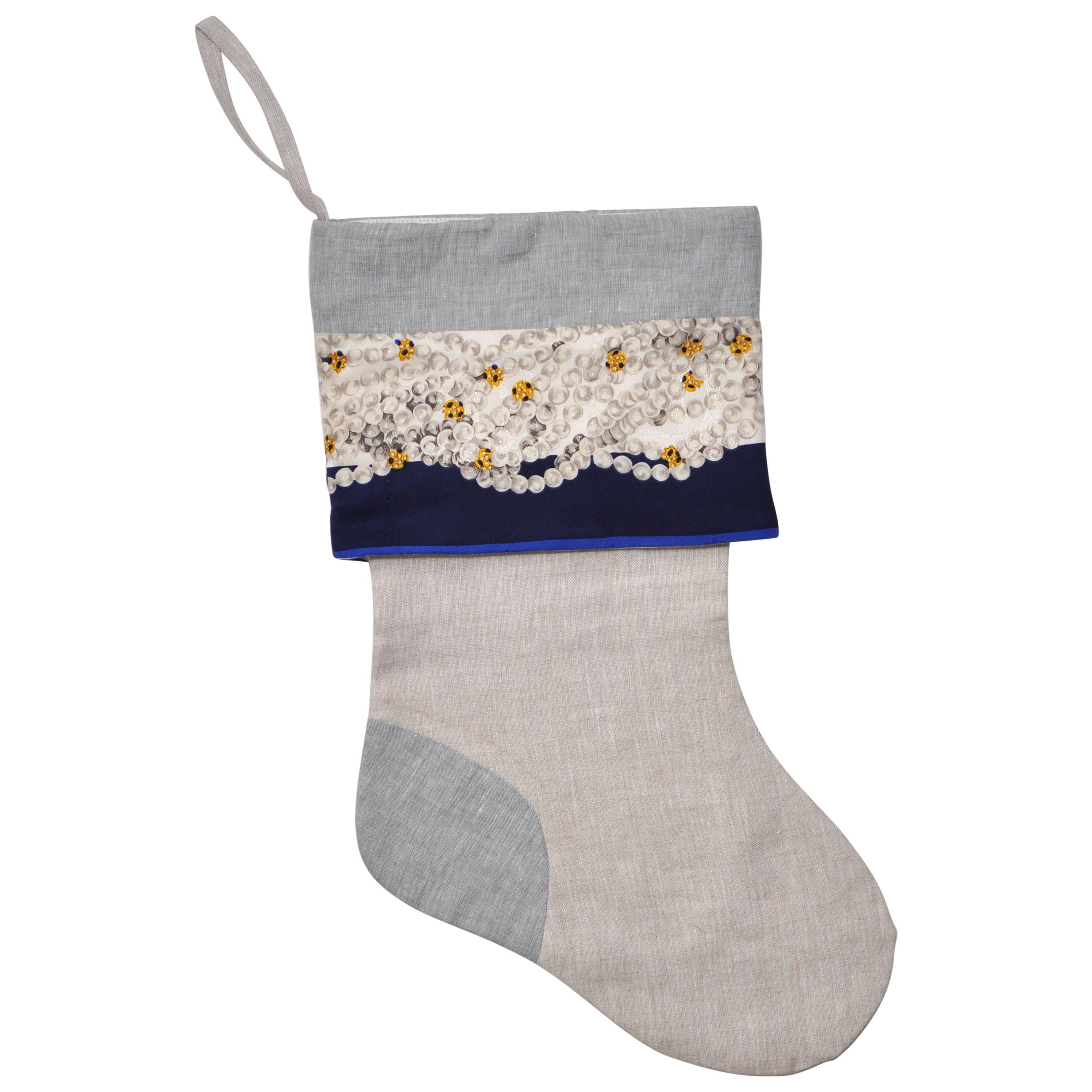 Vintage designer Cartier silk scarf and pure Irish linen Christmas stocking blue

Katie Larmour linen is known for her use of luxury salvaged materials, with this collection, each one-of-a-kind Christmas stockings has been uniquely created from a