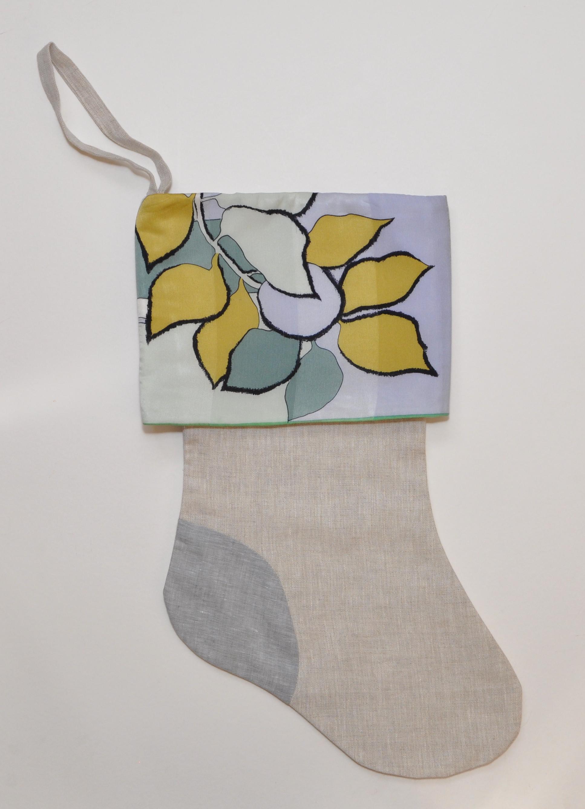 Vintage designer Christian Fischbacher silk scarf Irish linen Christmas stocking blue turquoise green gold

Katie Larmour linen is known for her use of luxury salvaged materials, with this collection, each one-of-a-kind Christmas stockings has been