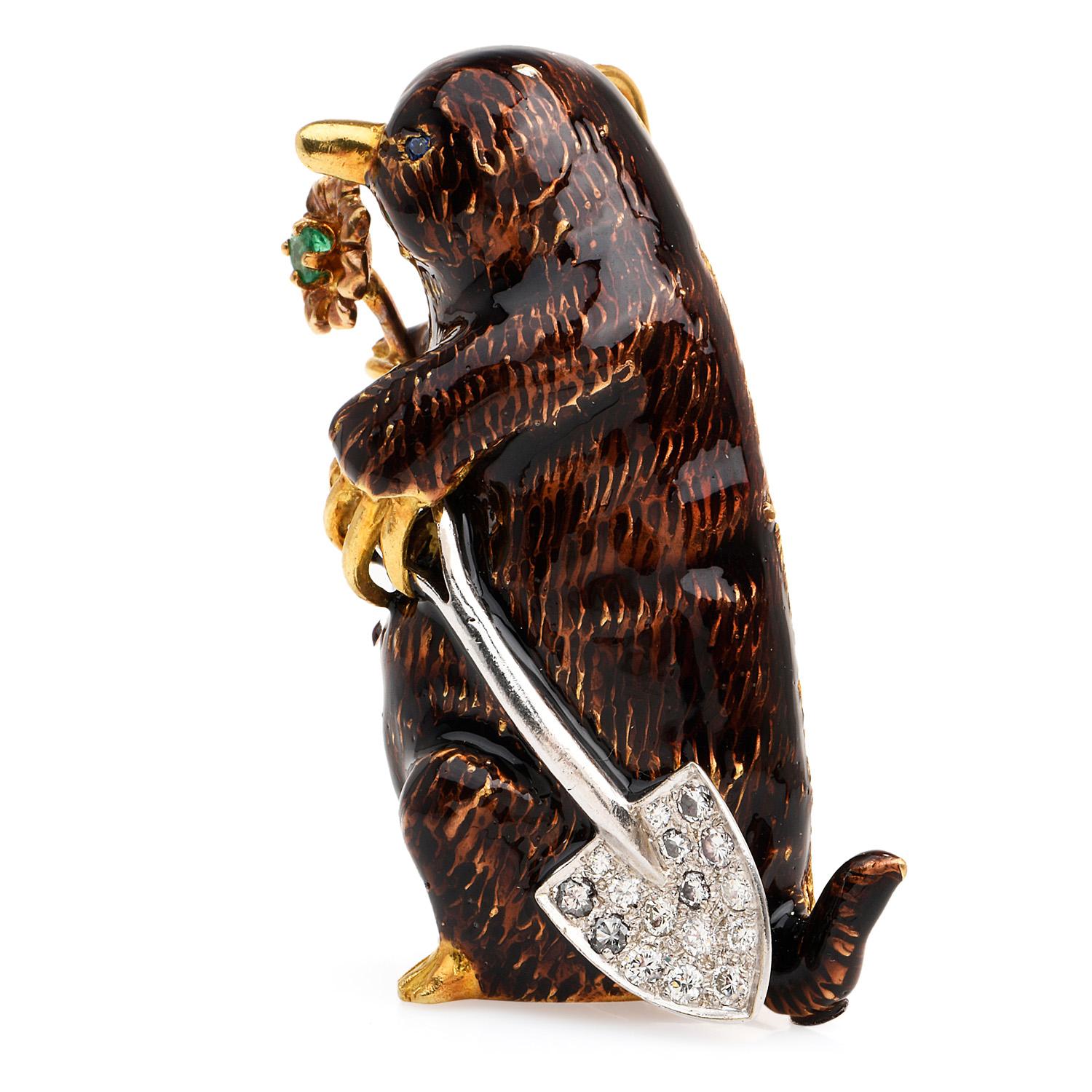 This Designer piece has Brown Enamel accents, inspired on the Mole, Echidna Animal motif with a sparkly Shovel, is an exquisite peculiar pendant,

Crafted in solid 18K Yellow & White Gold, the eye is composed by (1) round-cut, prong-set, blue