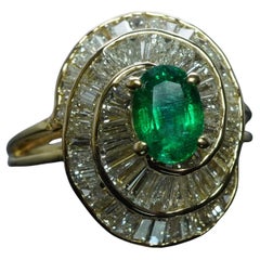 Bague ballerine vintage de créateur en or 18 carats avec émeraudes, diamants baguettes et tourbillons