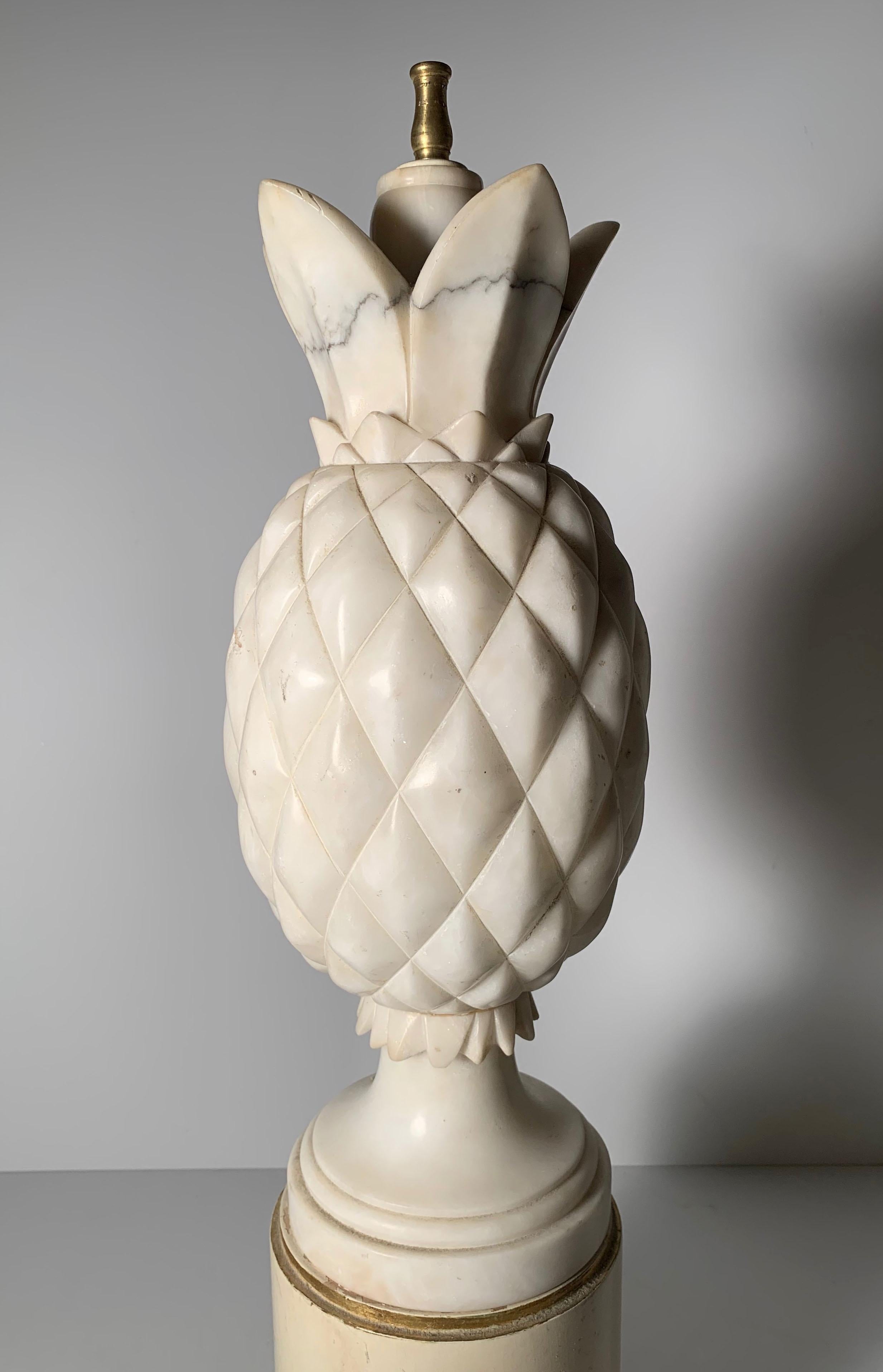 Beautiful pineapple form made in Italy in the mid-20th century. I think this may be Carrara marble. A nice pure white color. Hollywood Regency style.

Some minor vintage wear. One 