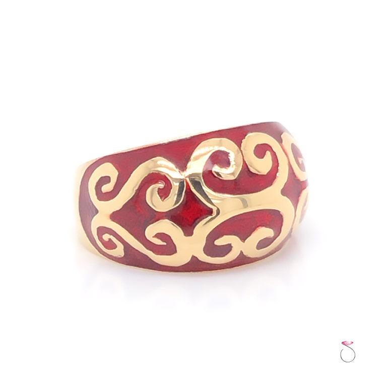 Stunning vintage enamel large dome ring my MAZ. The ring is beautifully crafted in 14K yellow gold and feature red enamel with gold swirl designs. The enamel on the ring is in excellent condition with no damage. This dome ring measures 12mm wide and