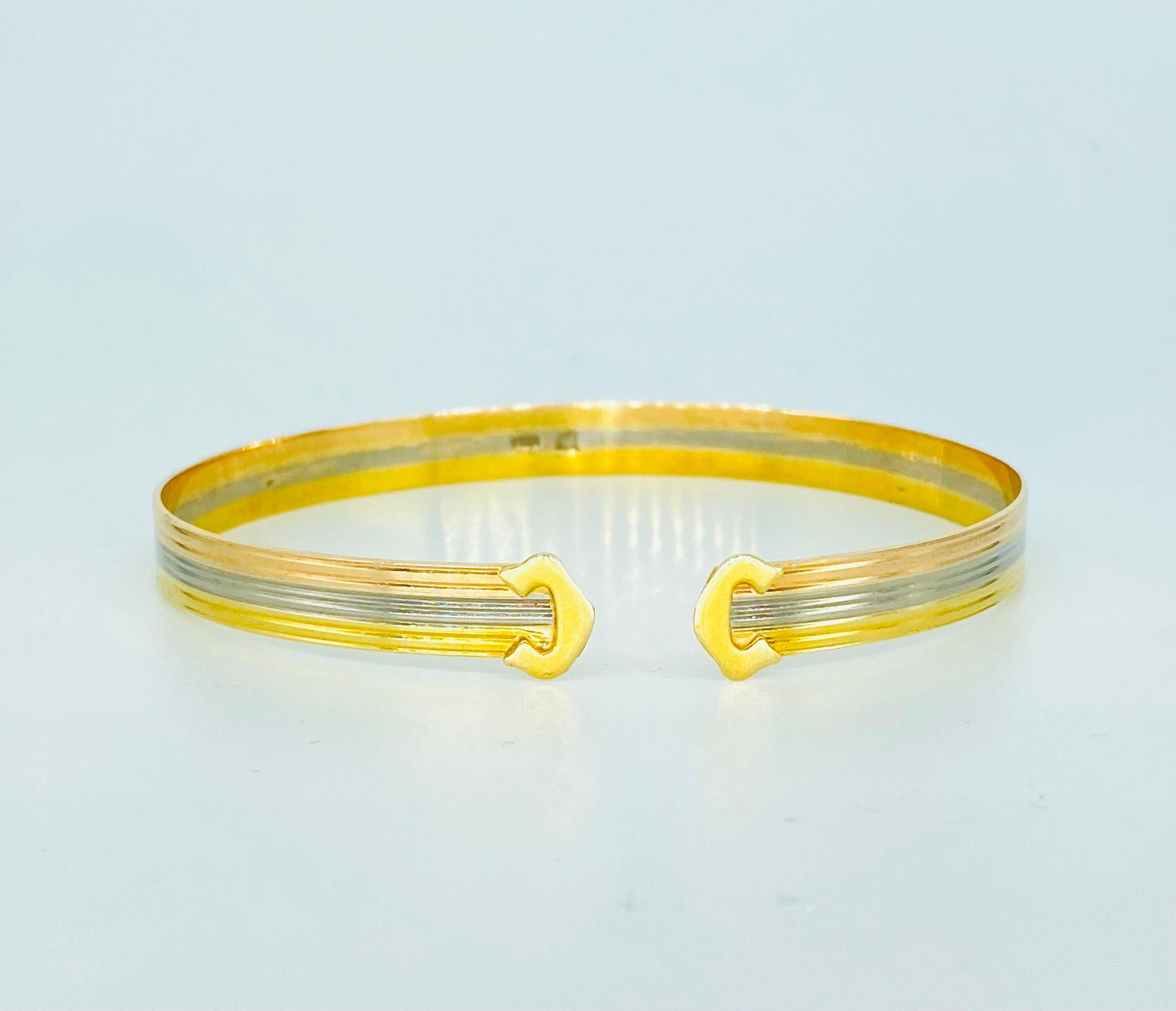 Bracelet jonc vintage de créateur en or 18 carats et tricolore Excellent état - En vente à Miami, FL
