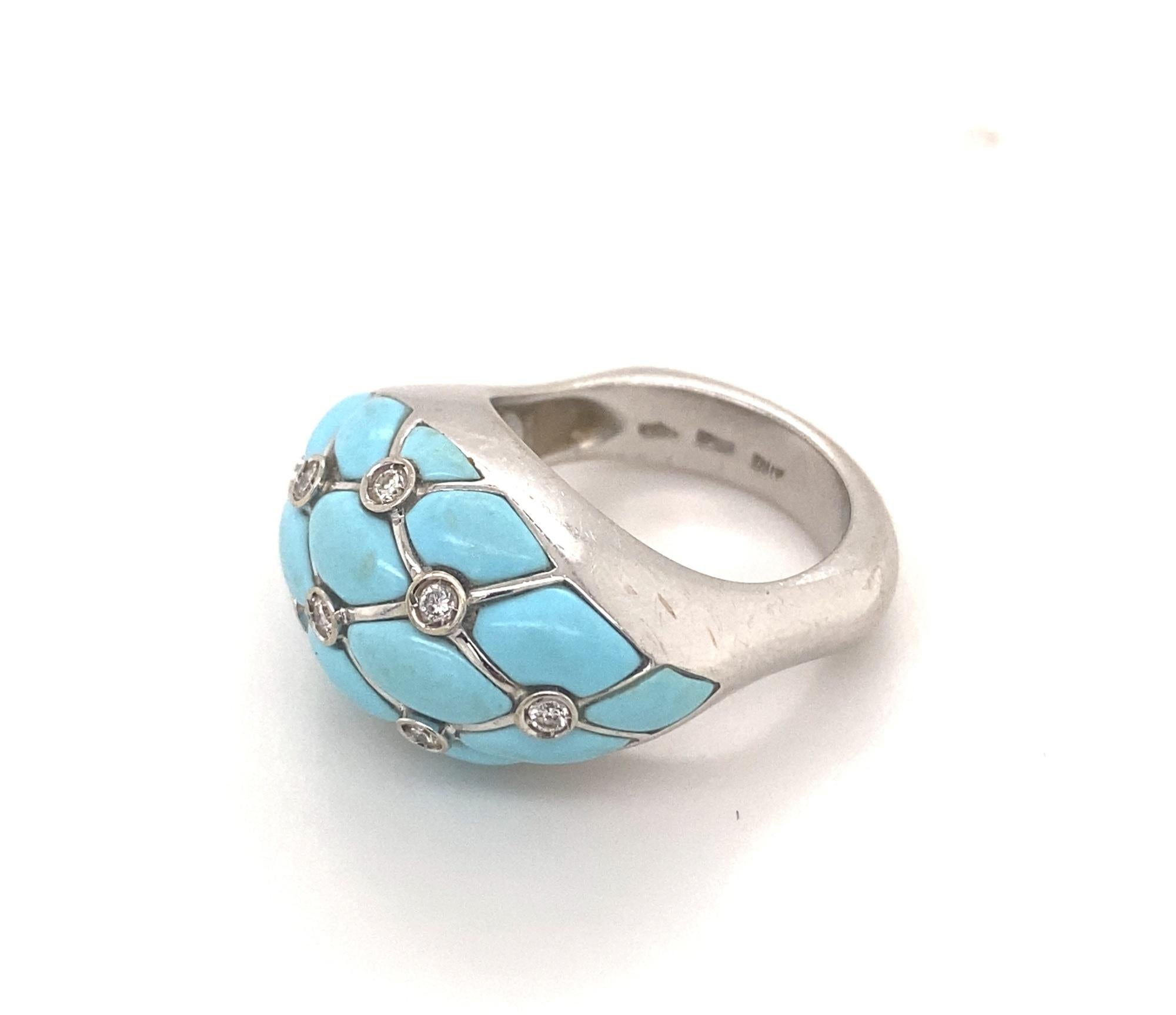 Vintage Designer Turquoise Diamonds Italian 18K White Gold Ring. This is a beautiful ring with Italian hallmarks and makers marks for 18K gold. The ring has a unique square shape with a dome of natural turquoise sections and 9 diamonds. The 16