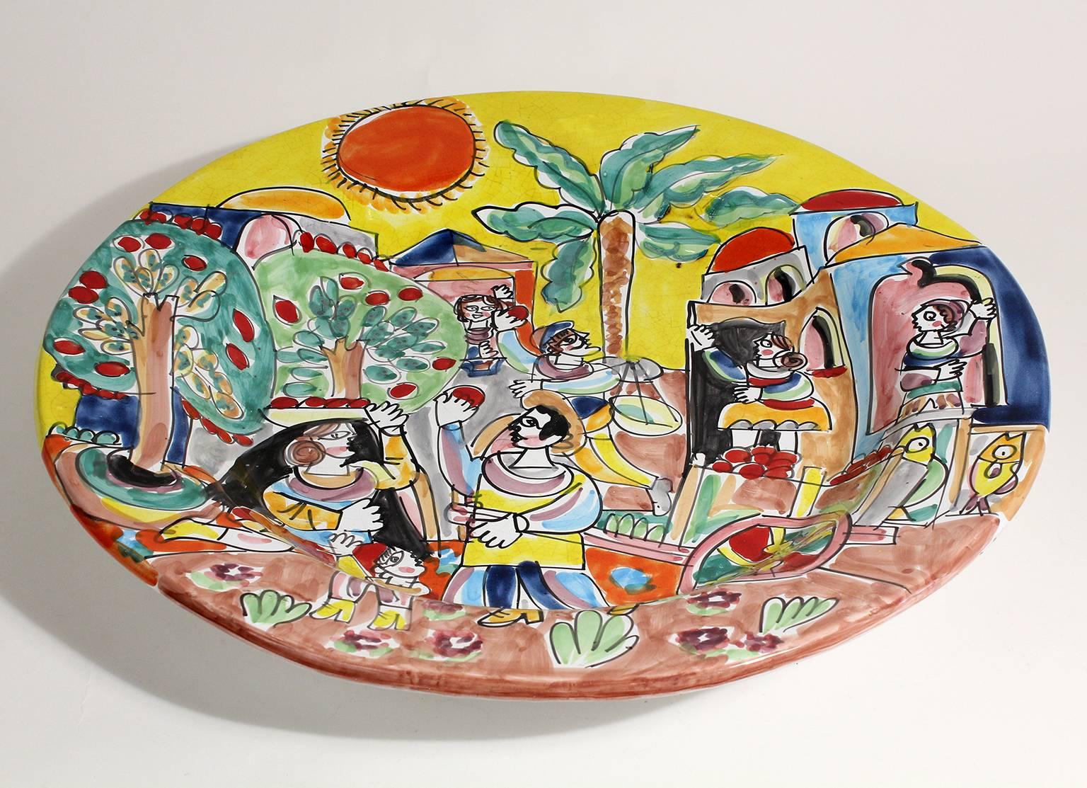Beautiful large DeSimone Italian pottery charger. Great colors and design. In excellent condition. Measures 21 1/2