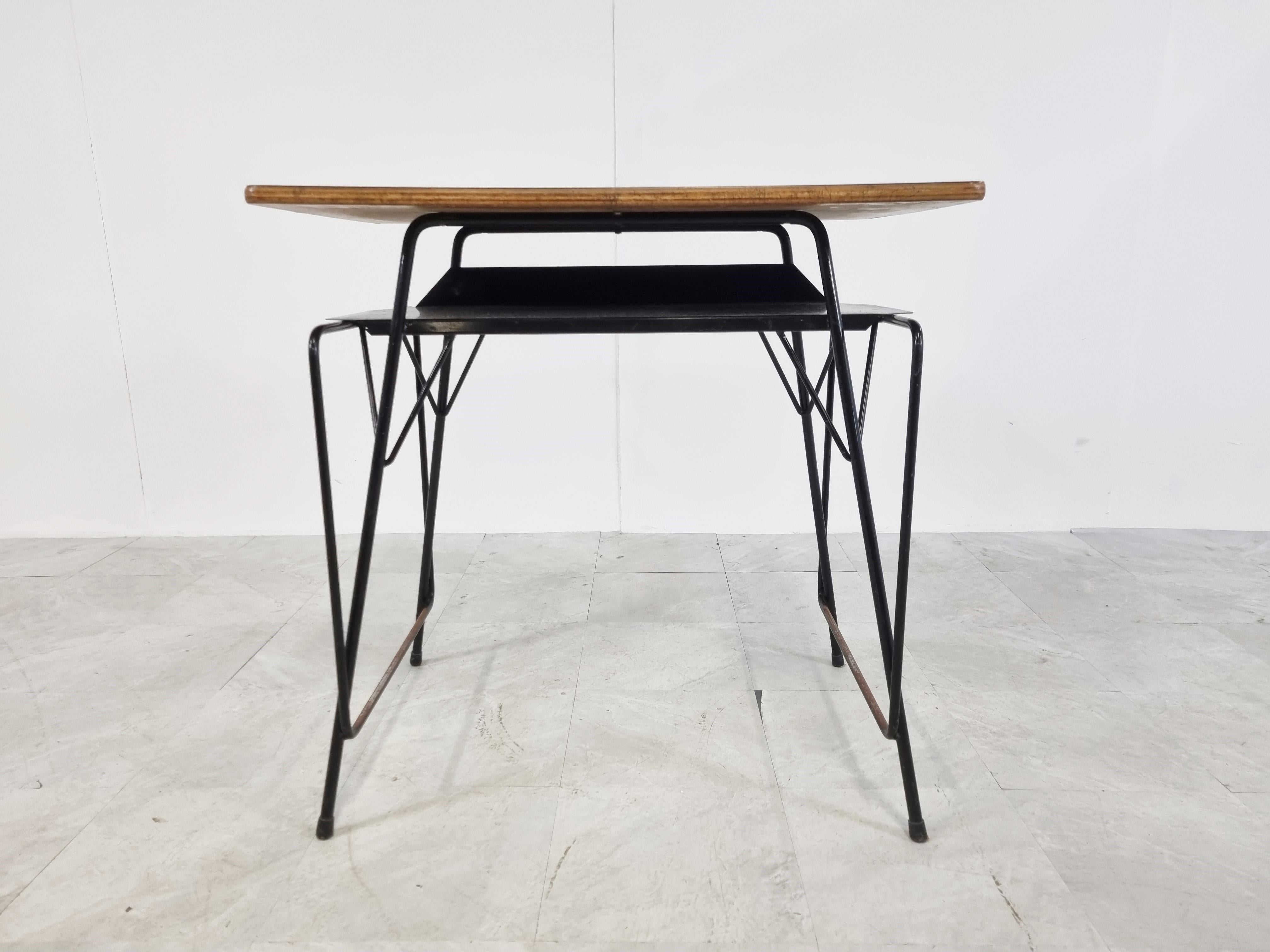 Mid century school desk designed by Willy Van Der Meeren and produced by Tubax in Belgium.

Industrial design which was widely used in schools. Sadly troughout the time when schools changed furniture, a lot of these disappeared and where