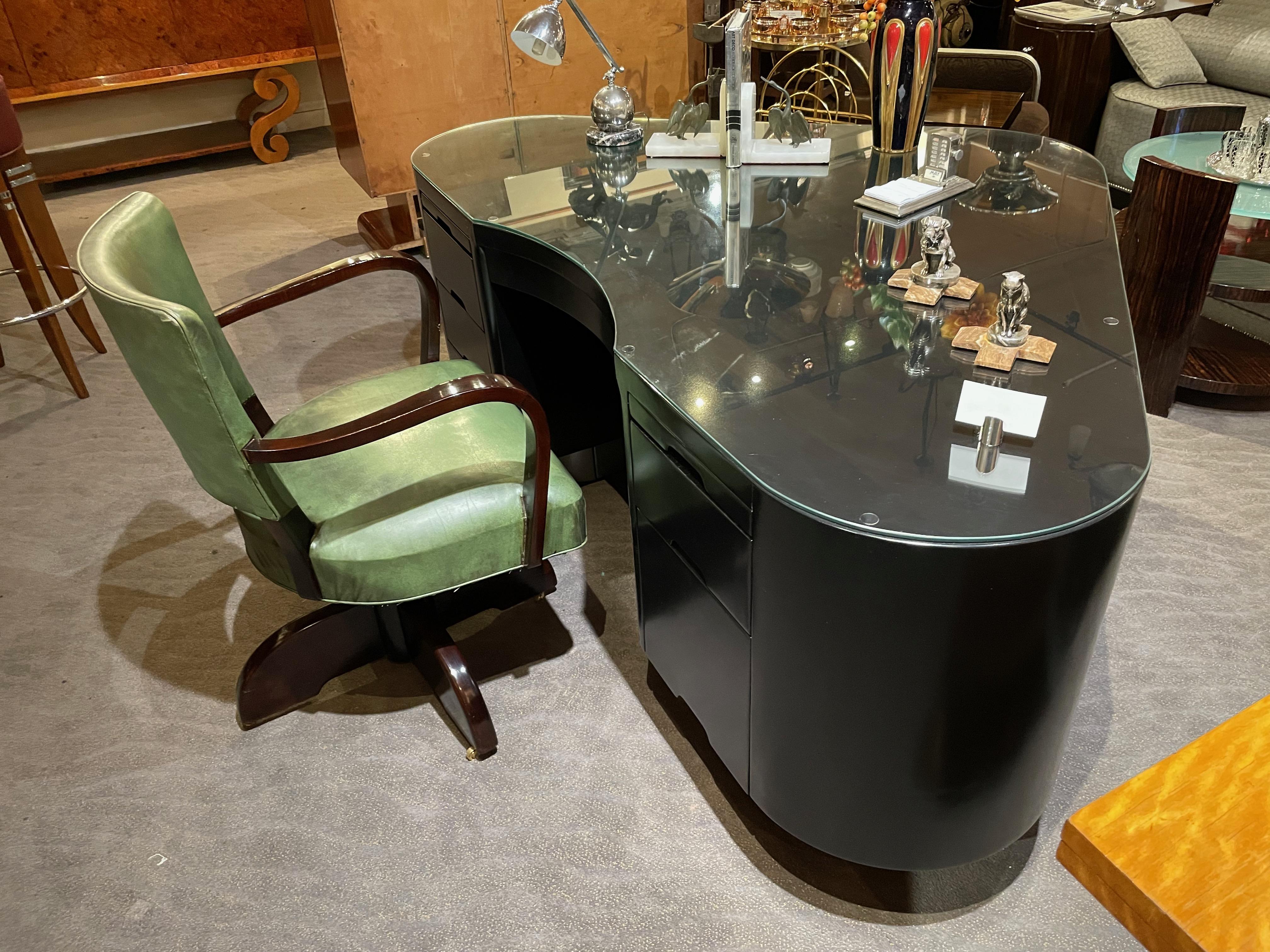 Vintage desk chair restored original leather with adjustable seat height from the wood base. This classic office chair is ready to serve another 50 years. The wood has been refinished in a stunning dark bentwood walnut stain. We were able to keep