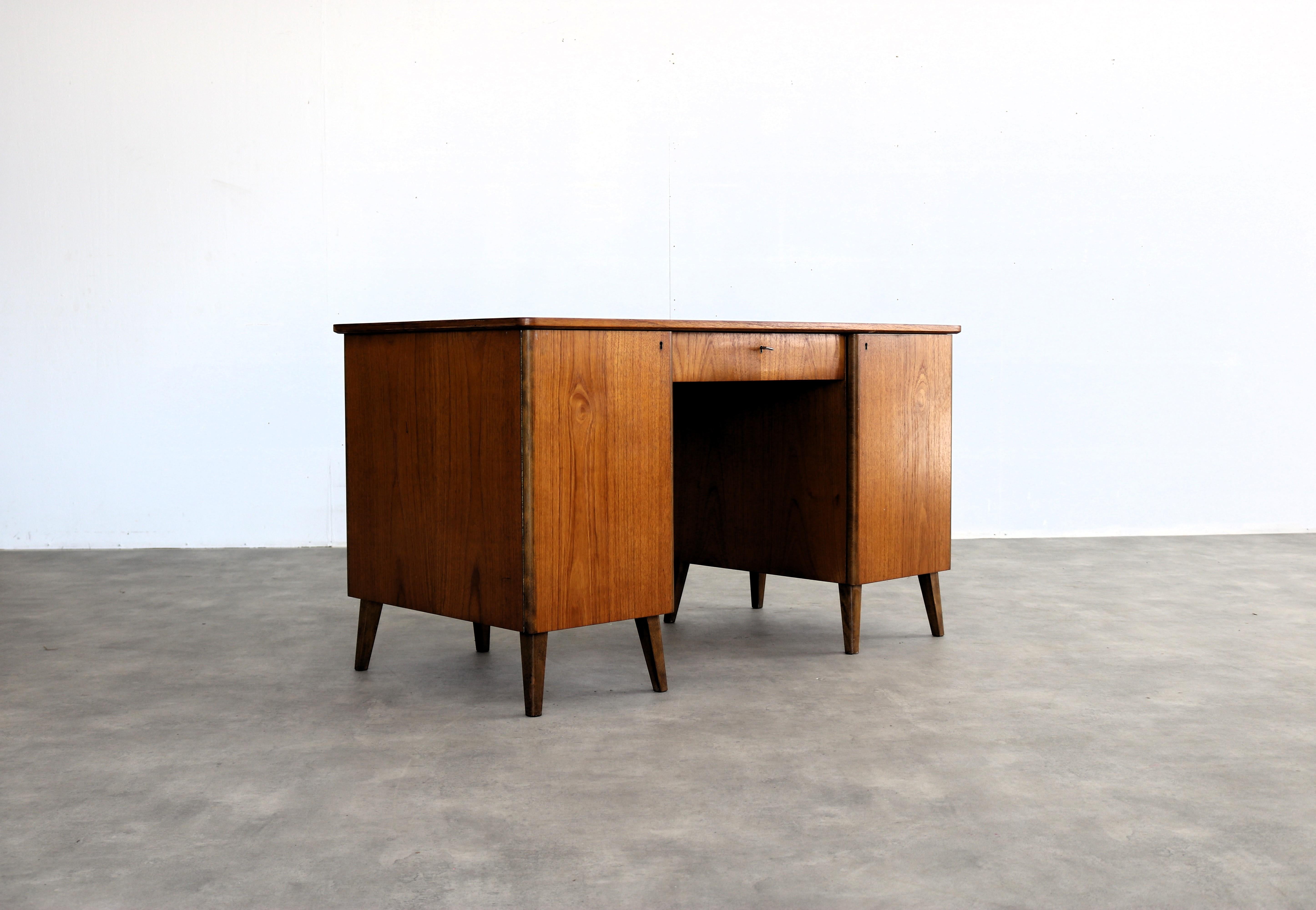 vintage desk  desk  1960s  Swedish

period  1960s
design  T. Nilsson  Glimakra  Sweden
condition  good  minor signs of use  colour difference  defective lock
size  74 x 130 x 67 (hxbxd)

details  teak;

item number  2828