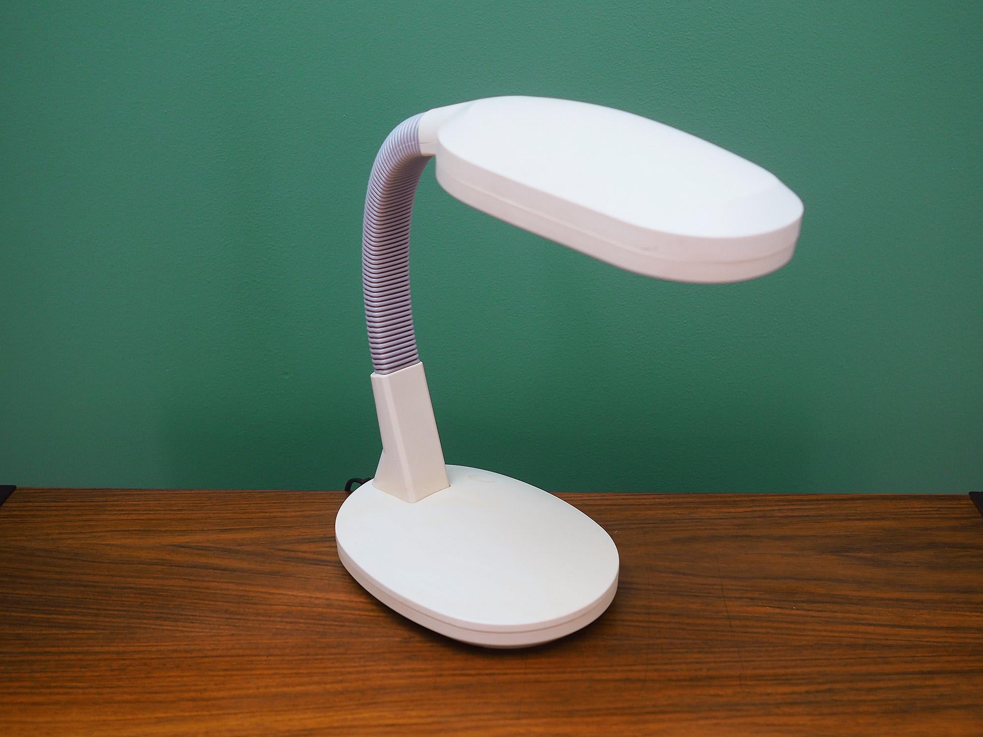 Fantastic desk lamp from the 1960s-1970s. Scandinavian design, Minimalist form. Lamp is entirely made of plastic. Preserved in good condition (minor scratches and discoloration) - directly for use.

Dimensions: height 44 cm, width 15 cm, length 14