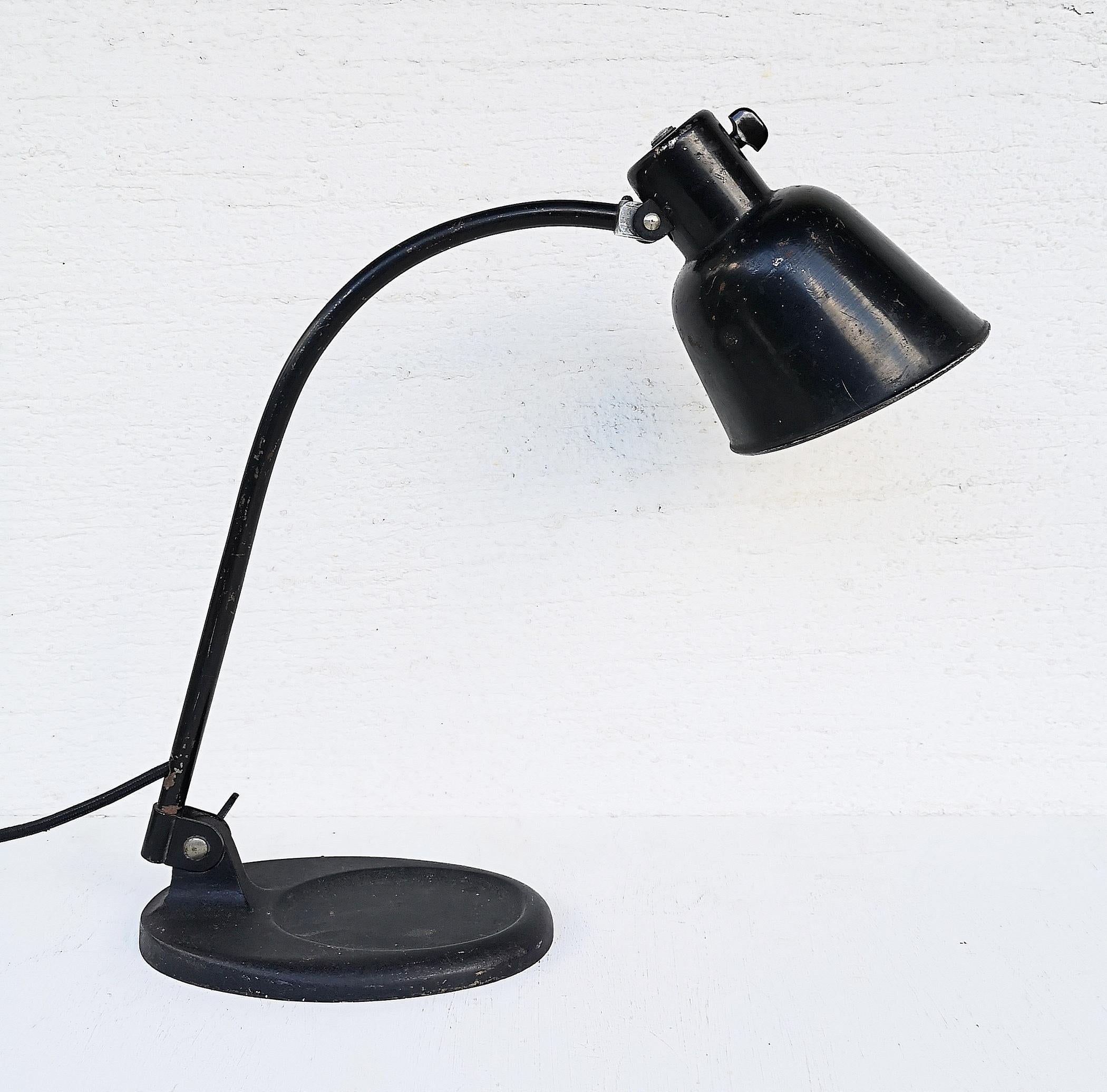 Great industrial desk lamp by Christian Dell. Model 2768 Matador Bur. Produced by the Bauhaus in the 30s. This is a vivid representative of the Bauhaus.
Christian Dell is a jeweler and designer from Germany. Years of life - 1893-1974. He was a