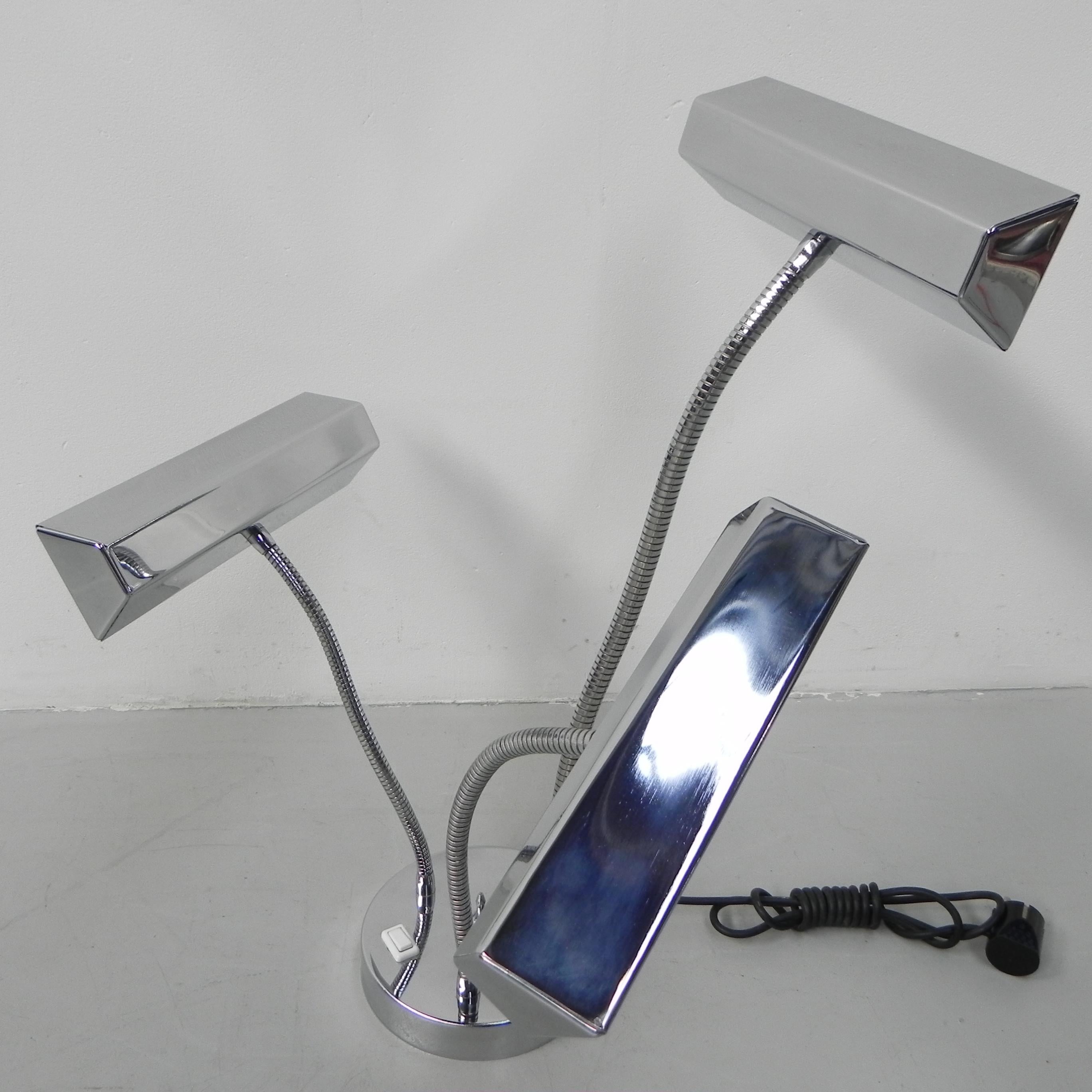 Height (max): 60 cm.
Width: 40 cm.
Depth: 30 cm.
Shade dimensions: 5x8x25 cm.
Base plate: Ø17 cm, height: 3.5 cm.
The lamp is equipped with 3 small bulb holders (E14).
Origin: France, 1960s.
Material: chromed steel.
All our lamps are suitable for