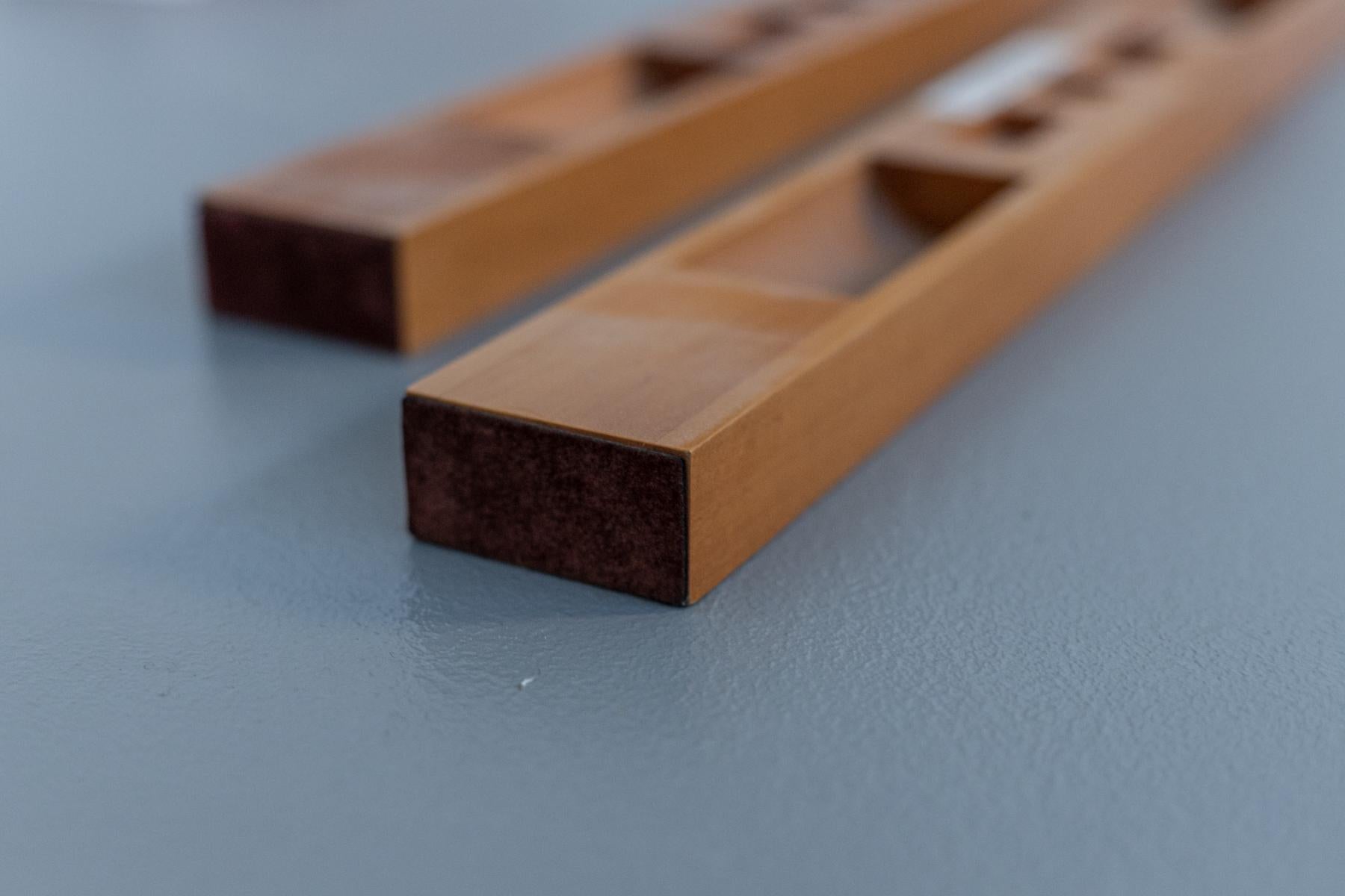 Beautiful set of fine wood desk prototypes designed by Pierluigi Ghianda in the 60's, of fine Italian manufacture.
The desk set is composed of two identical elements: It is composed of two larger side compartments and three smaller central ones.