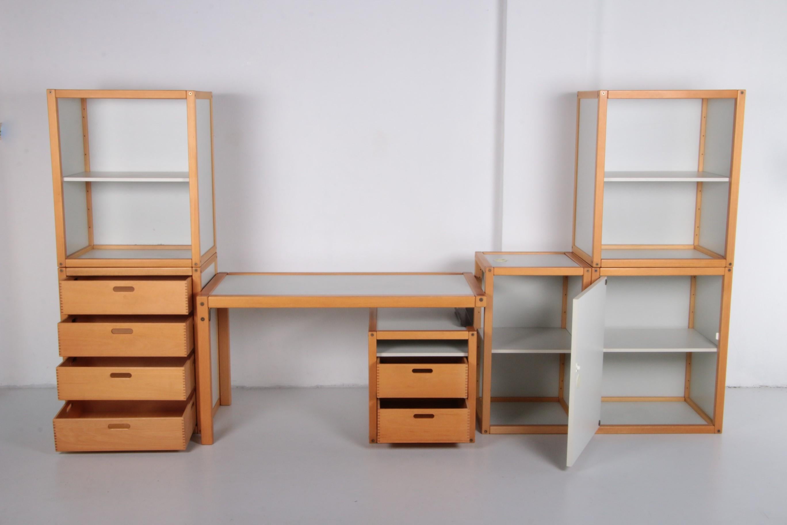 This German desk is part of the Profilsystem collection, designed by Elmar Flötotto for the Flötotto brand in the 1980s. 

The principle behind the Profilesystem is simple. The set comes with different elements that you can place exactly as you