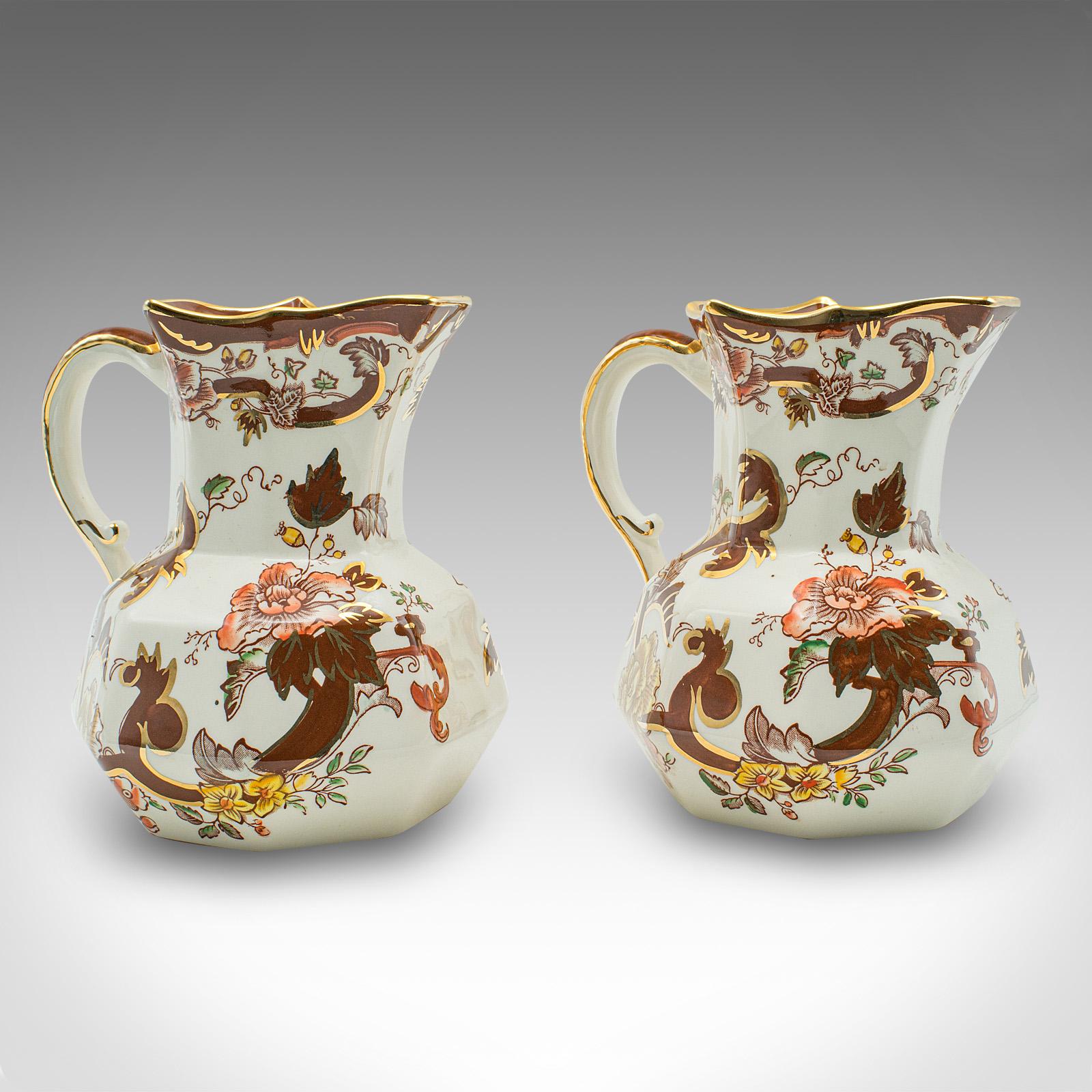 
This is a vintage dessert service. An English, ceramic decorative trifle bowl, cake plate and pouring jugs, dating to the late 20th century, circa 1970.

Charming 1970s dessert service, with an eye-catching pattern
Displaying a desirable aged
