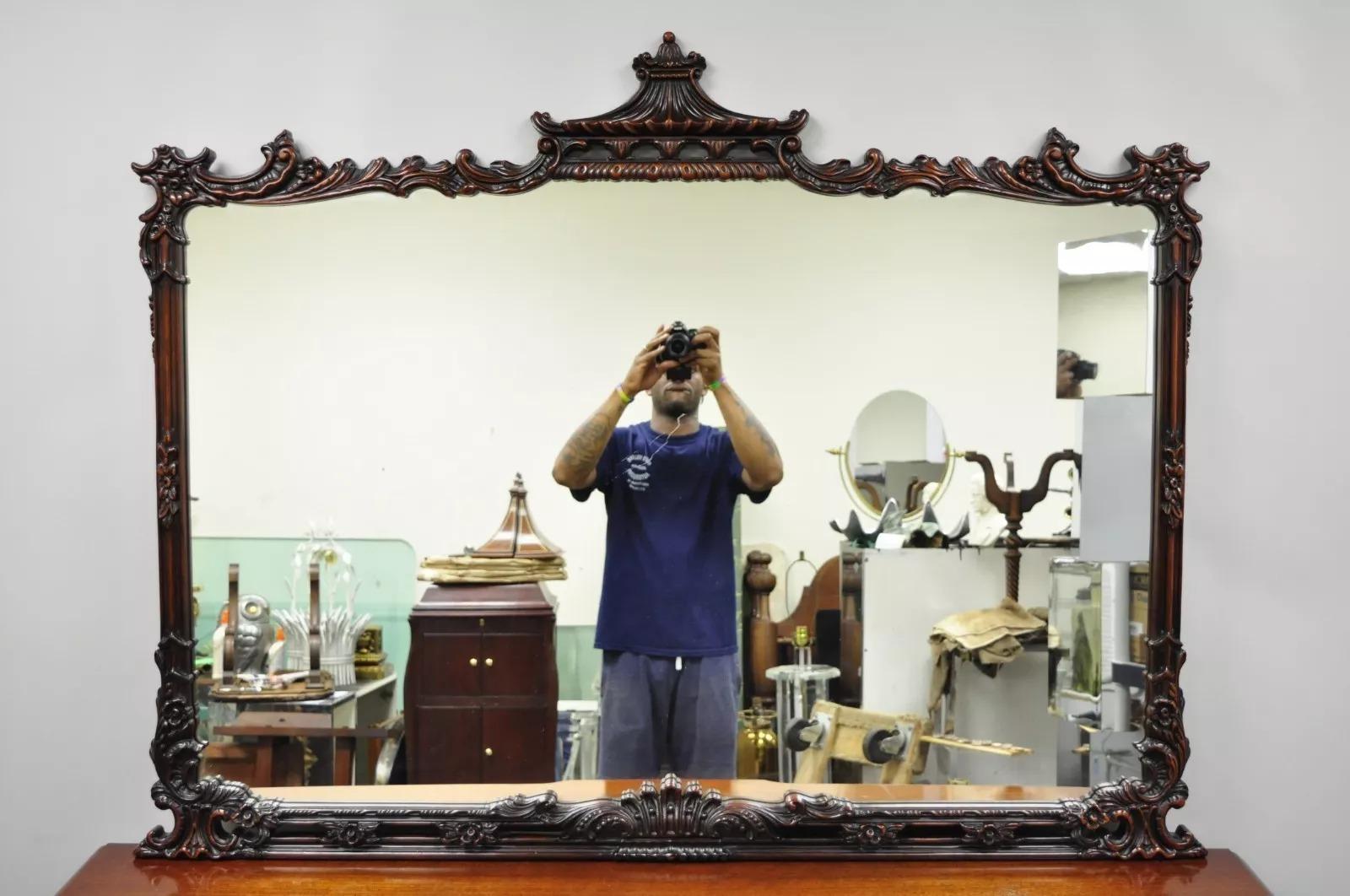 Vintage Chinese Chippendale Flame Mahogany Triple Dresser Chest & Mirror by Detroit Furniture. Item features, center with red leather panel, beautiful flamed wood grain, ornately carved details, 12 dovetailed drawers, solid brass hardware, mirror