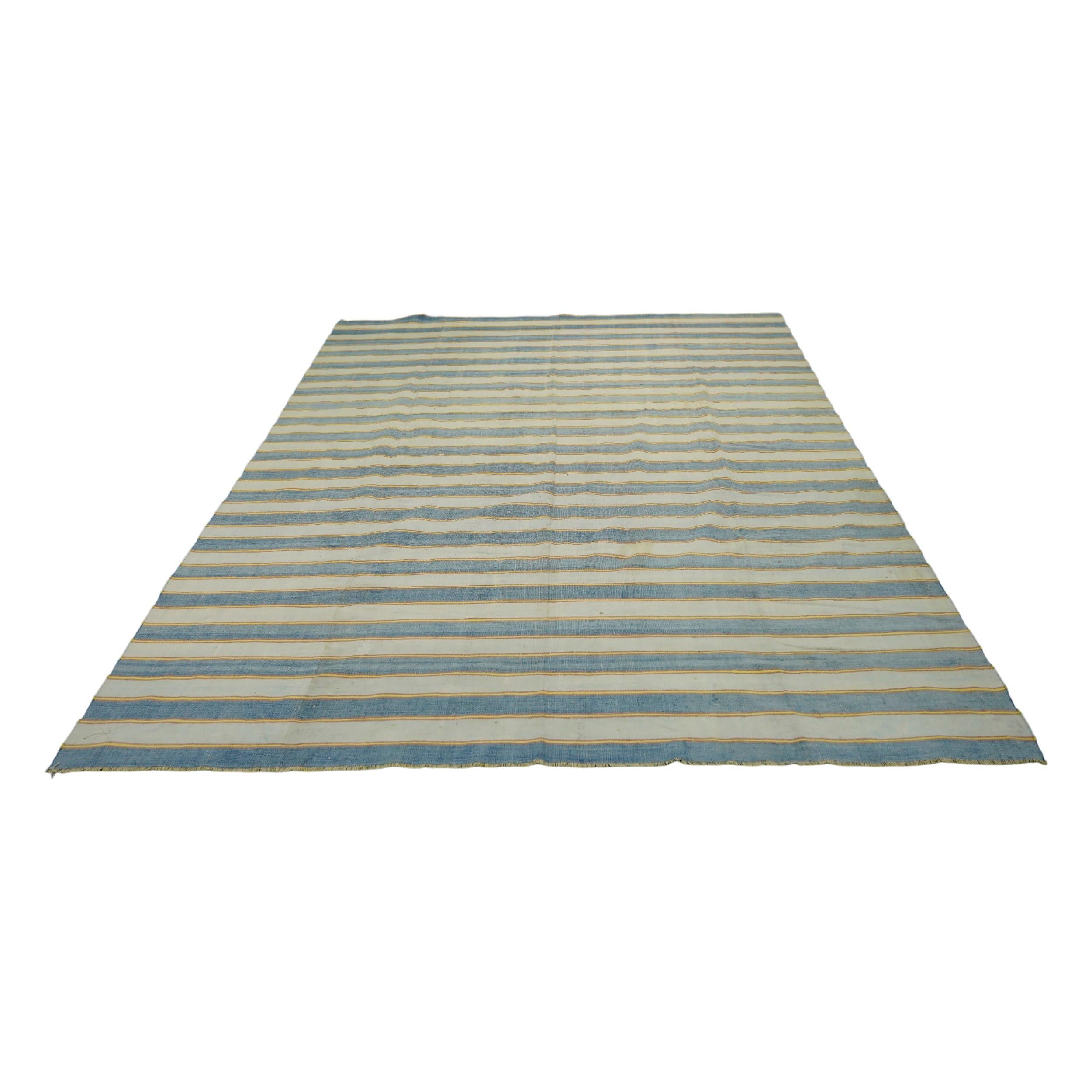 This 8x9 vintage Dhurrie rug is an exciting new curation from Rug & Kilim’s latest acquisition of rare and exemplary mid-century flatweaves of the same style—handwoven in cotton in India circa 1950-1960. 

On the Design: 

Admirers of the craft will