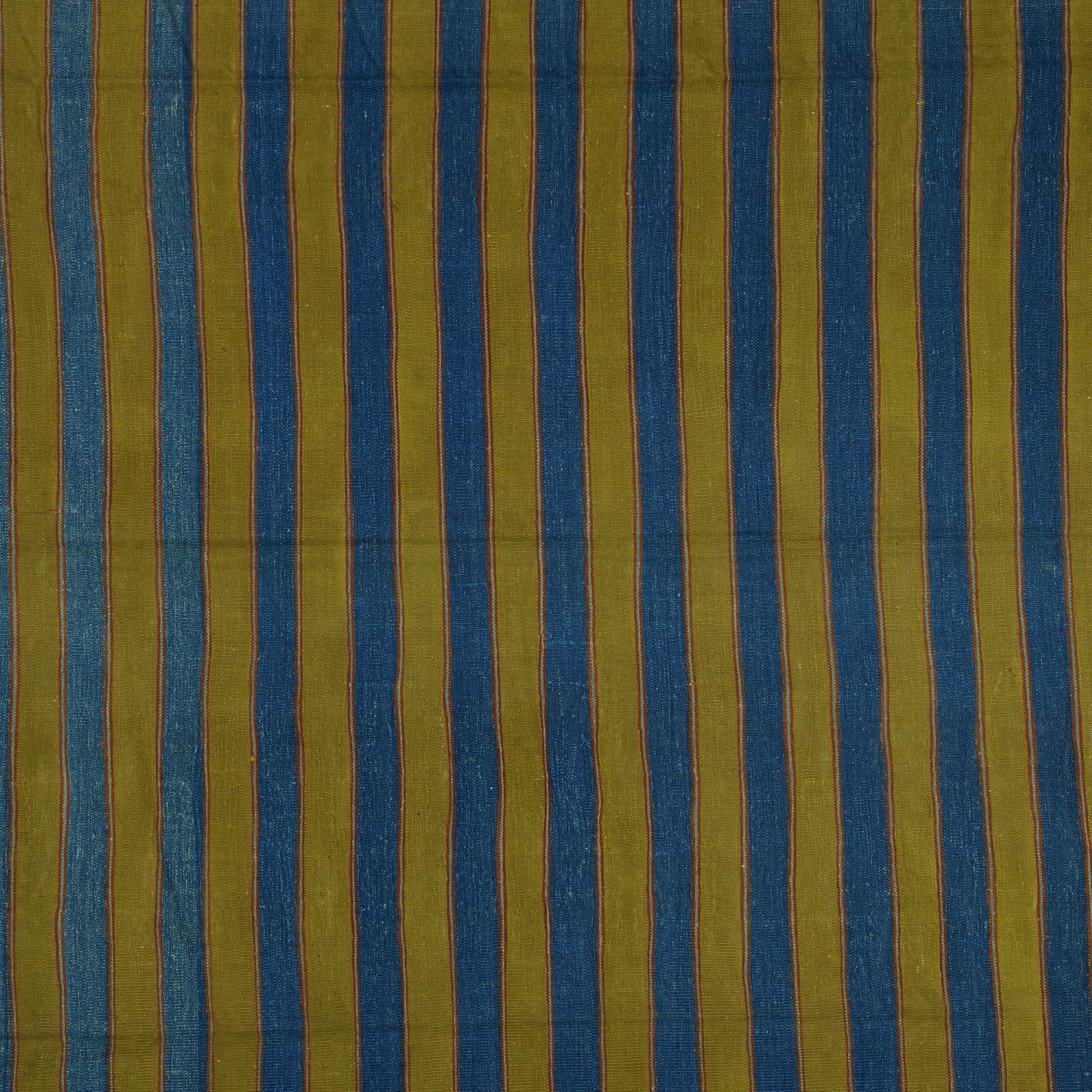 This 8x11 vintage Dhurrie rug is an exciting new curation from Rug & Kilim’s latest acquisition of rare and exemplary mid-century flatweaves of the same style—handwoven in cotton in India circa 1950-1960. 

On the Design: 

Admirers of the craft