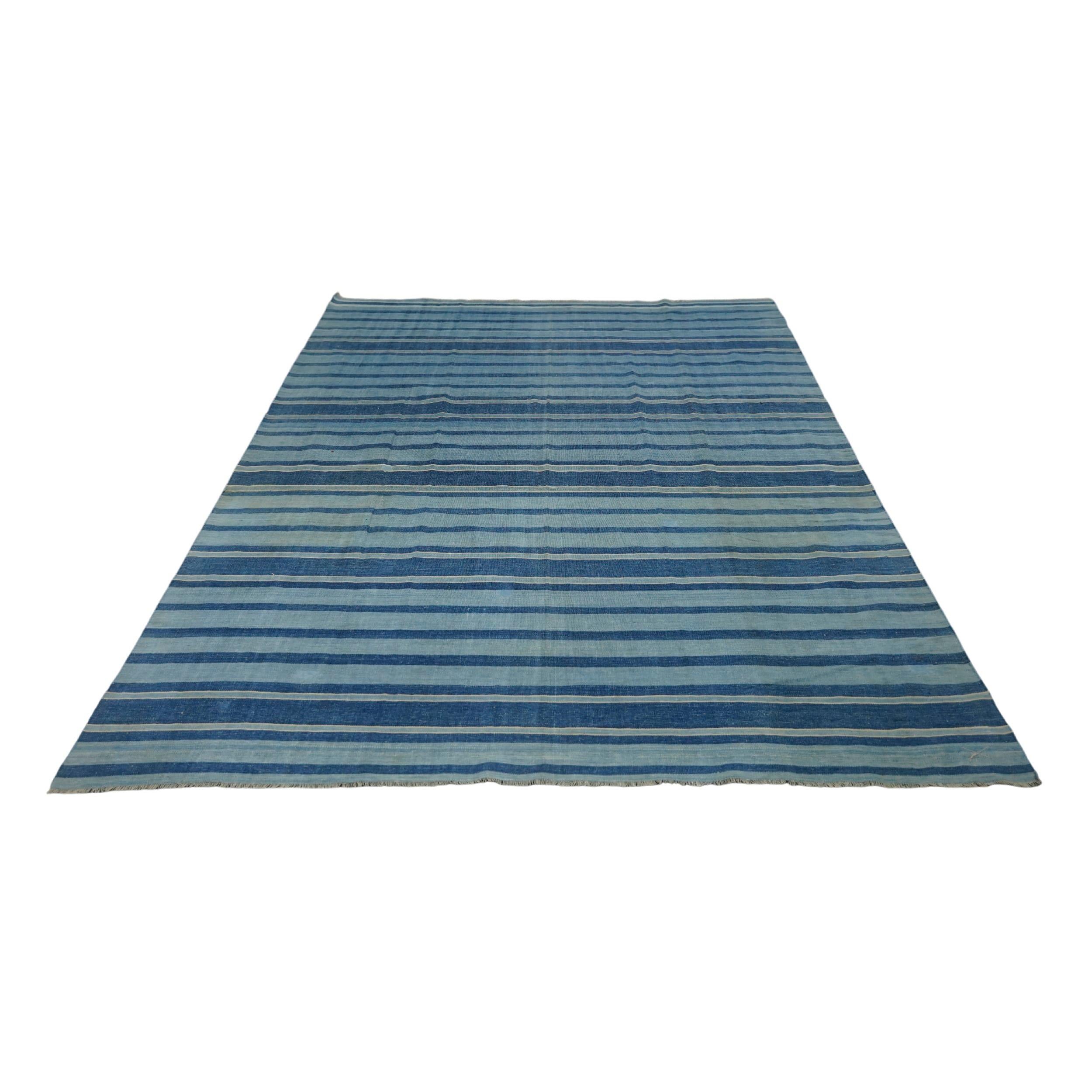 This 7x9 vintage Dhurrie rug is an exciting new curation from Rug & Kilim’s latest acquisition of rare and exemplary mid-century flatweaves of the same style—handwoven in cotton in India circa 1950-1960. 

On the Design: 

Admirers of the craft will
