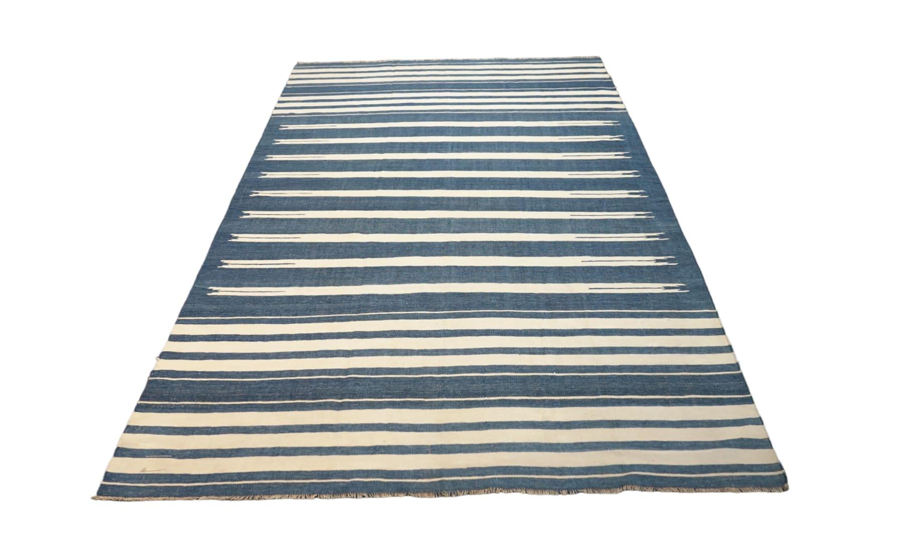 This vintage 5x8 Dhurrie flat weave is an exciting new entry in Rug & Kilim’s esteemed collection. Handwoven in wool, it originates from India circa 1950-1960. 

On the Design: 

From Rug & Kilim’s exclusive collection of vintage flatweaves, a