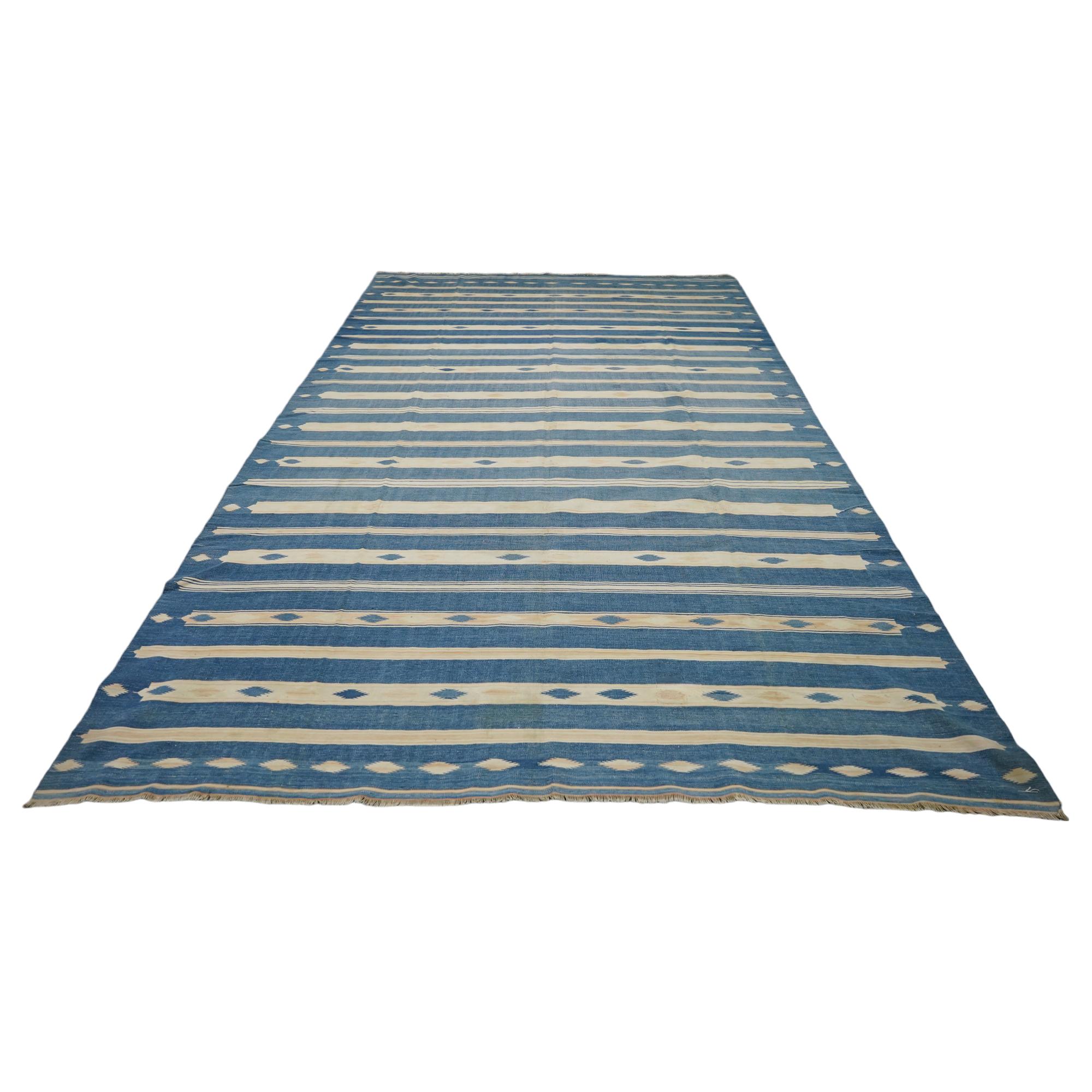 This 8x14 vintage Dhurrie runner rug is an exciting new curation from Rug & Kilim’s latest acquisition of rare and exemplary mid-century flatweaves of the same style—handwoven in cotton in India circa 1950-1960. 

On the Design: 

Admirers of the