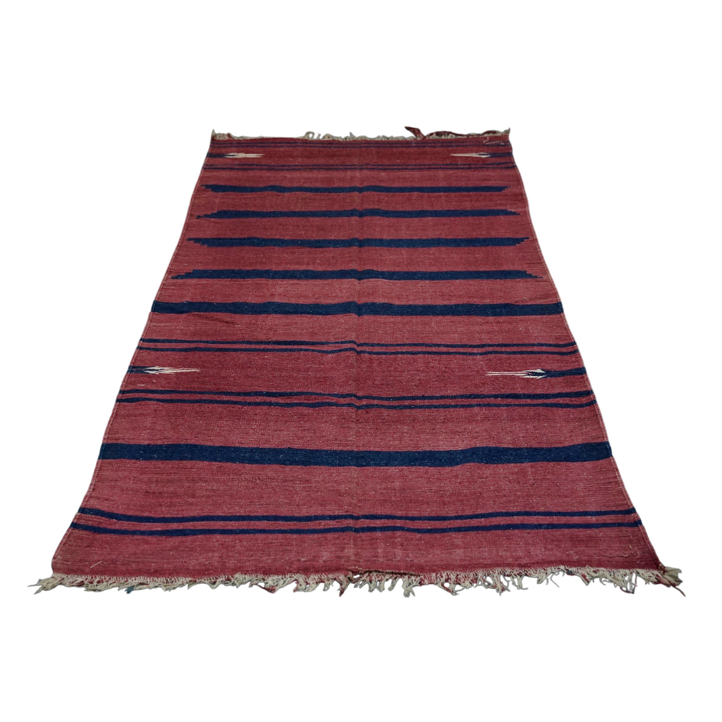 This 4x8 vintage Dhurrie rug is an exciting new curation from Rug & Kilim’s latest acquisition of rare and exemplary mid-century flatweaves of the same style—handwoven in cotton in India circa 1950-1960. 

On the Design: 

Admirers of the craft will