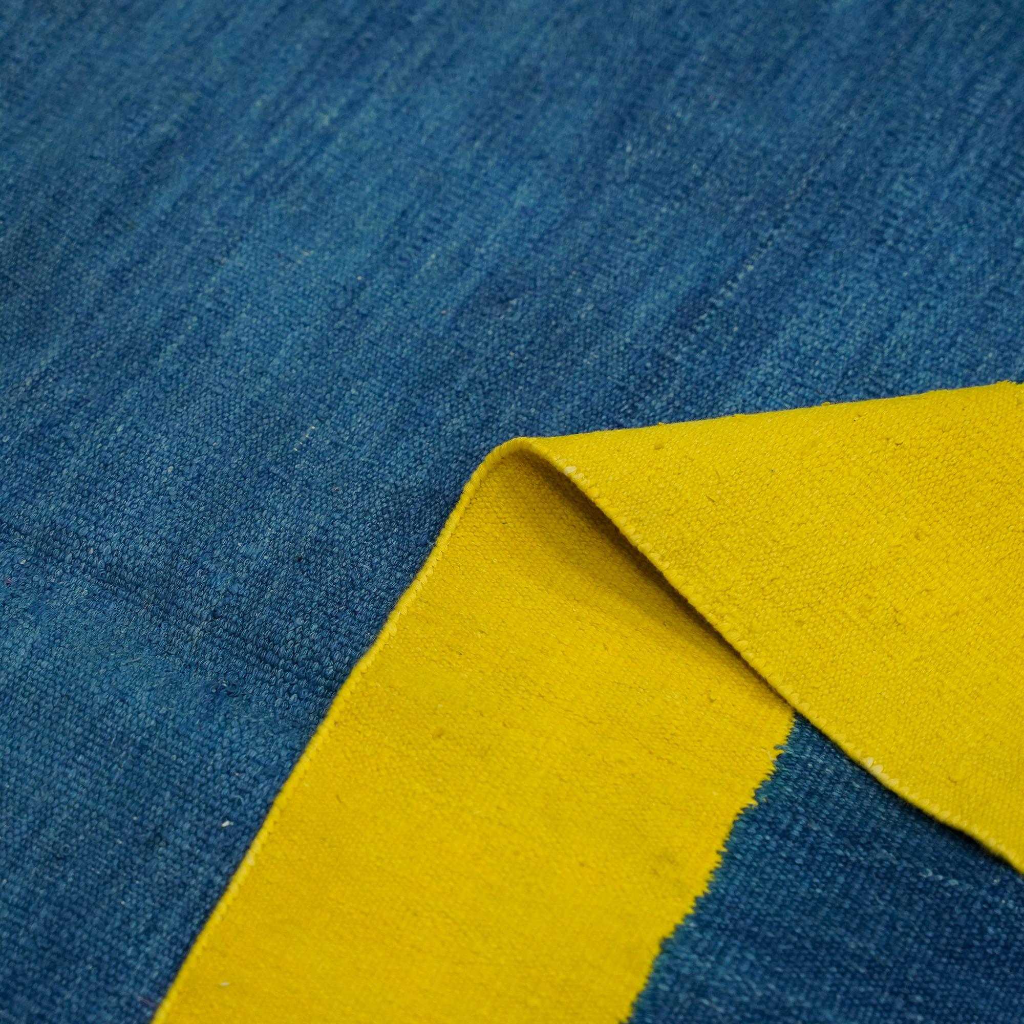 Mid-20th Century Vintage Dhurrie Solid Rug in Blue Open Field with Yellow Border  Rug & Kilim For Sale