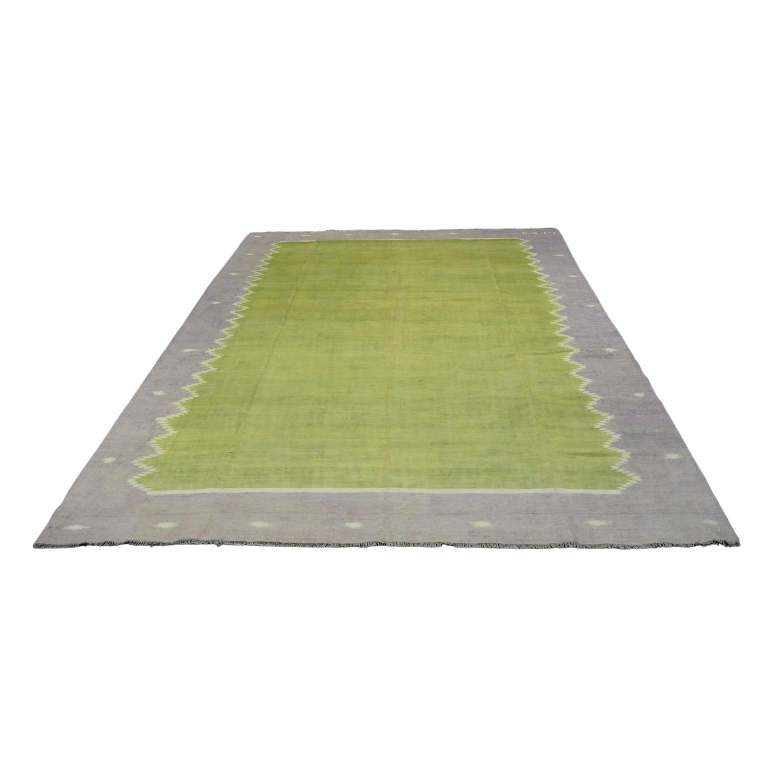 This 8x11 vintage Dhurrie rug is an exciting new curation from Rug & Kilim’s latest acquisition of rare and exemplary mid-century flatweaves of the same style—handwoven in cotton in India circa 1950-1960. 

On the Design: 

Admirers of the craft