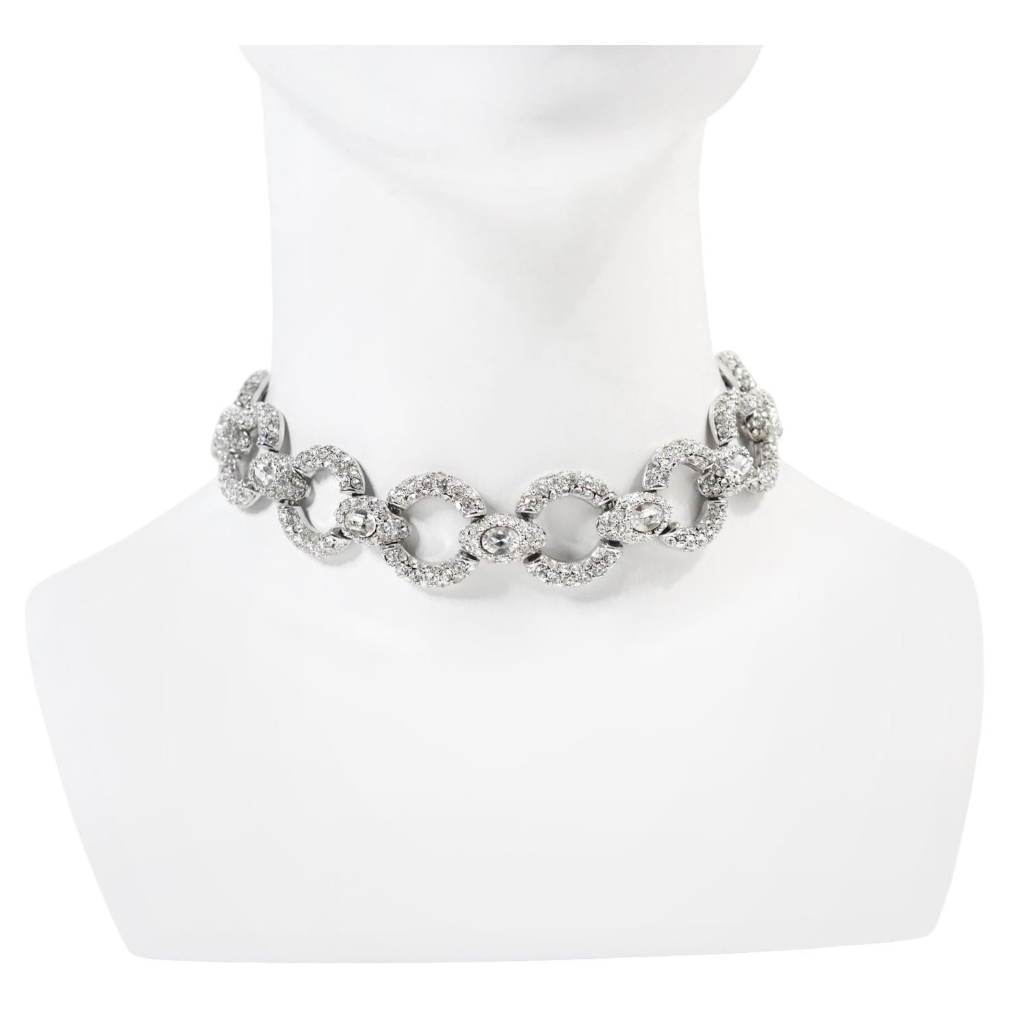 Vintage Diamante Pave Wide Choker Circa 1980s. This is just a cool piece but has no curb appeal until you see it on. Then it comes alive. Oval circles of wide pave and then a large crystal in the middle separates each piece.

Substantial and well