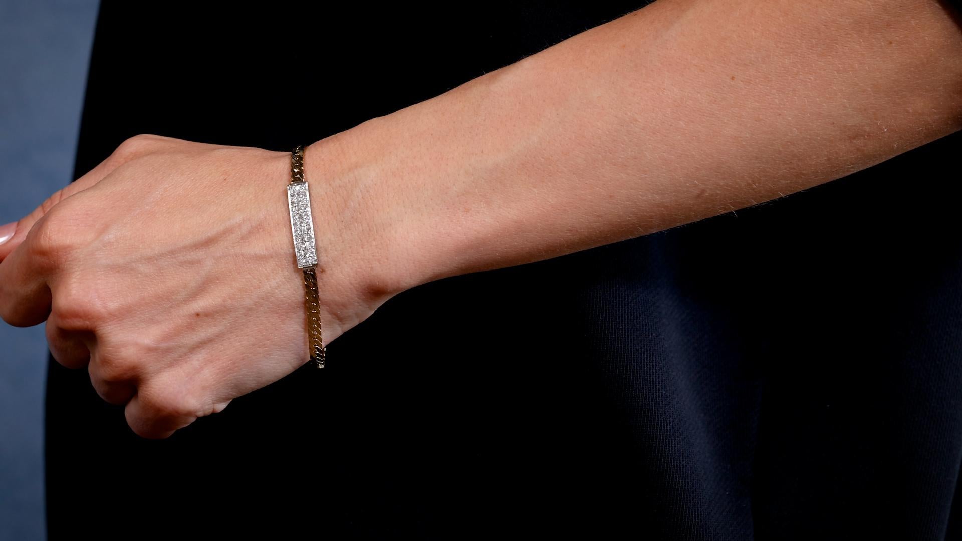 Ein Vintage Diamond 14k Gold ID-Armband. Mit 33 Diamanten im europäischen Einzel- und Altschliff mit einem Gesamtgewicht von ca. 0,70 Karat, eingestuft in Farbe H-I, Reinheit SI-I. Gefertigt aus 14 Karat Gelb- und Weißgold mit Feingehaltsangabe.