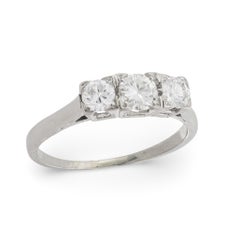 Anello vintage con diamante e tre pietre in oro bianco 14k