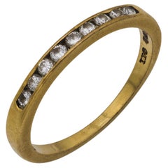 Hochzeitsring aus 14 Karat Gelbgold mit Diamanten