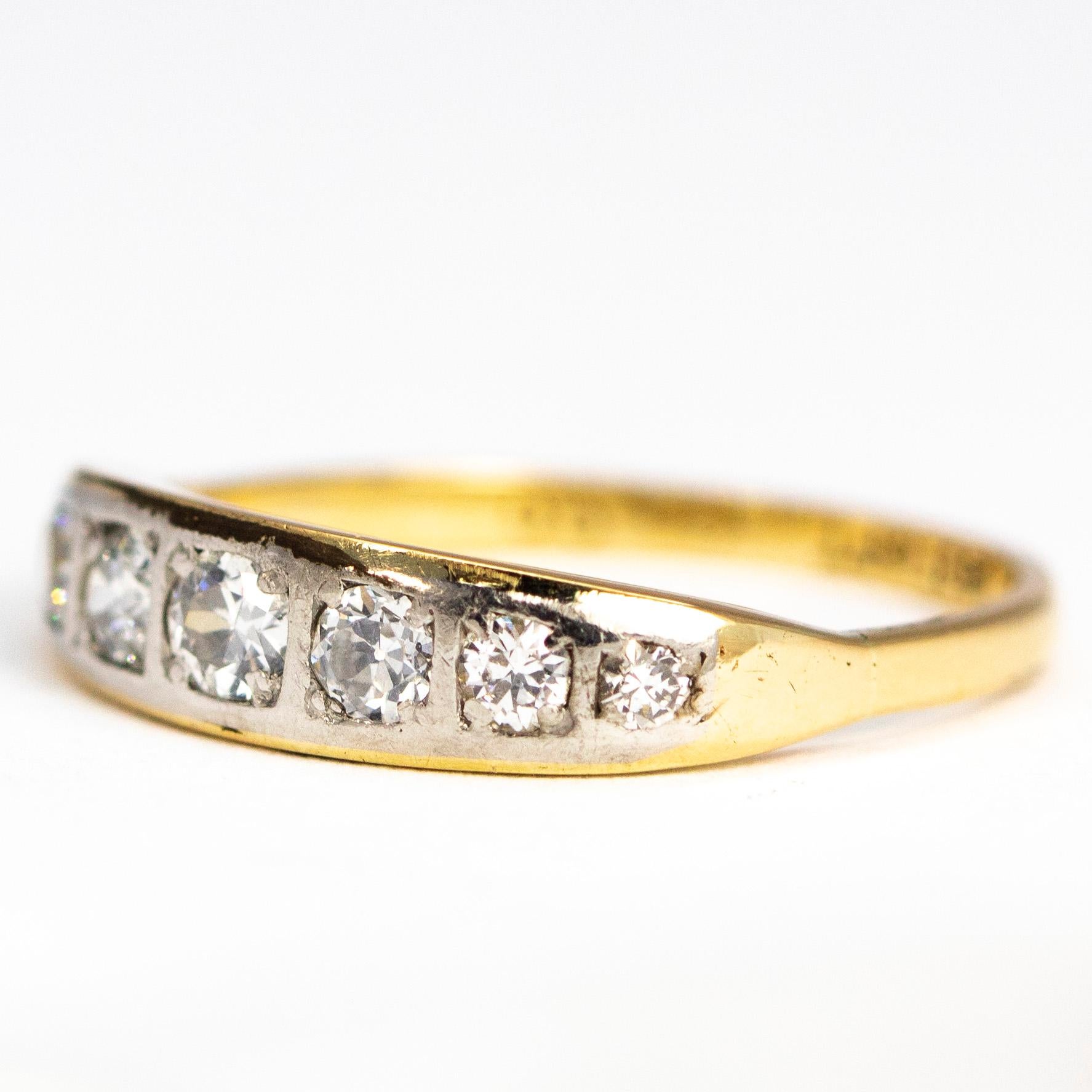 Approximately 70pts of diamonds are held in this beautiful piece. All the stones are set flush in platinum and the rest of the band is modelled in 18ct gold. The size of the stones are slightly graduated starting with the largest diamond in the
