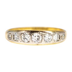 Vintage Diamond, 18 Carat Gold and Platinum Seven-Stone Band