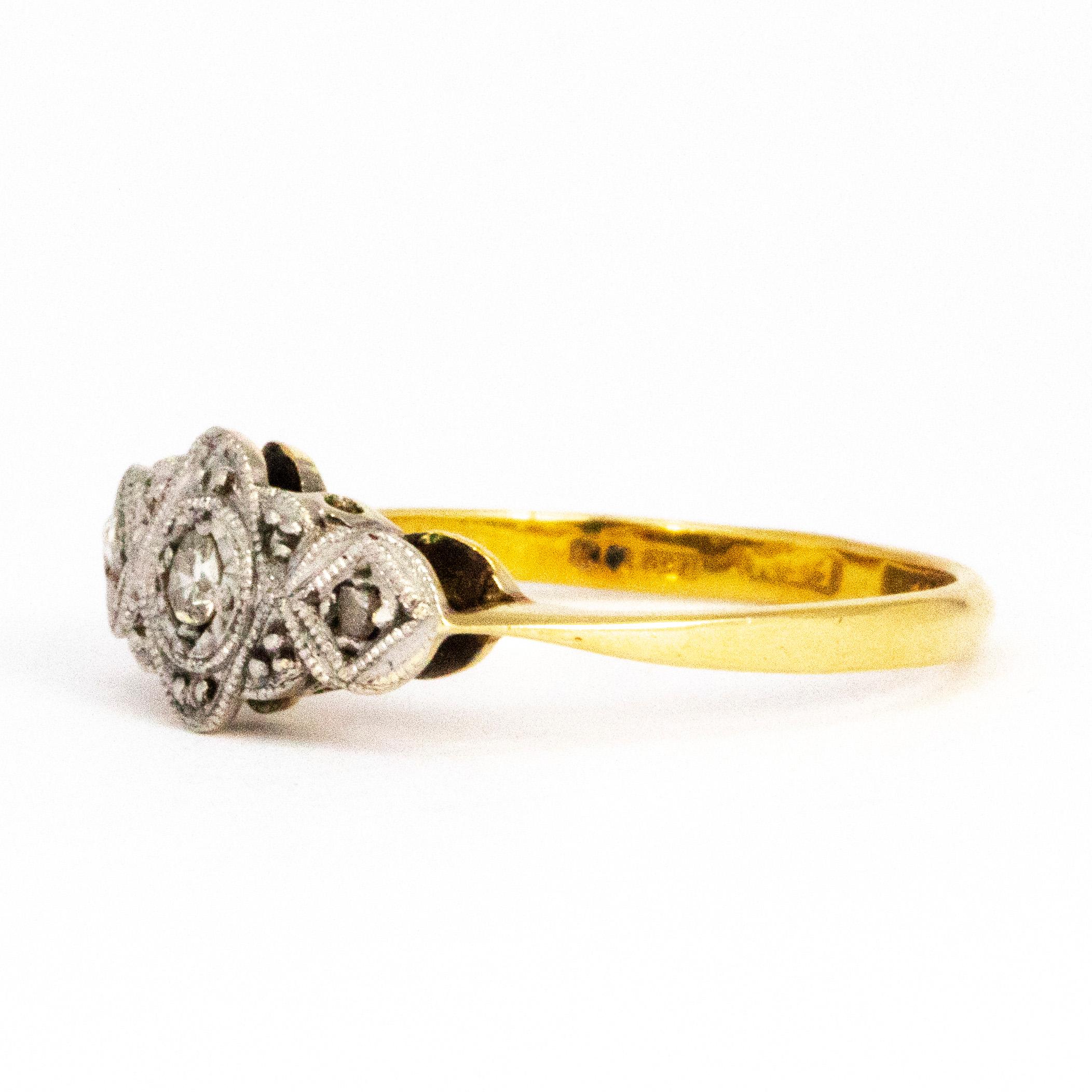 This gorgeous vintage ring has a real art deco feel to it because of the shapes and settings used. The centre diamond measures 7pts and the two outer diamonds measure 3pts each. The stones are all set in detailed platinum and the ring itself is