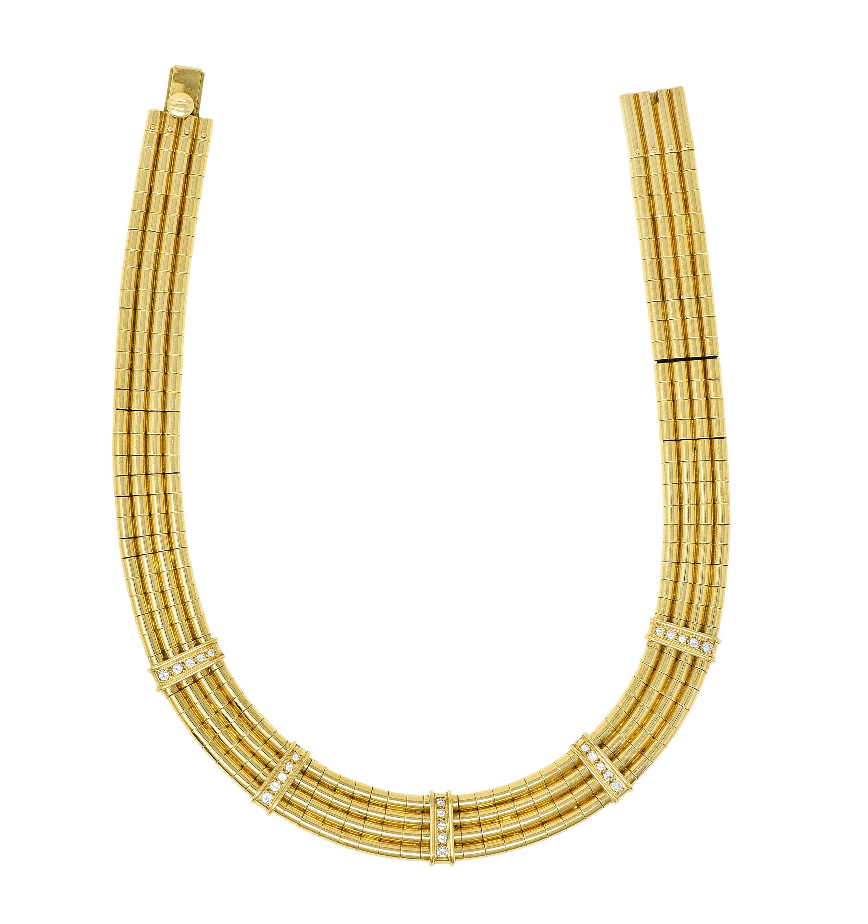 Collar necklace is designed as multiple strands threaded with deeply ridged barrel links

Featuring five linear stations accented by round brilliant cut diamonds - graduating in size

Weighing in total approximately 1.25 carats with G/H color and VS