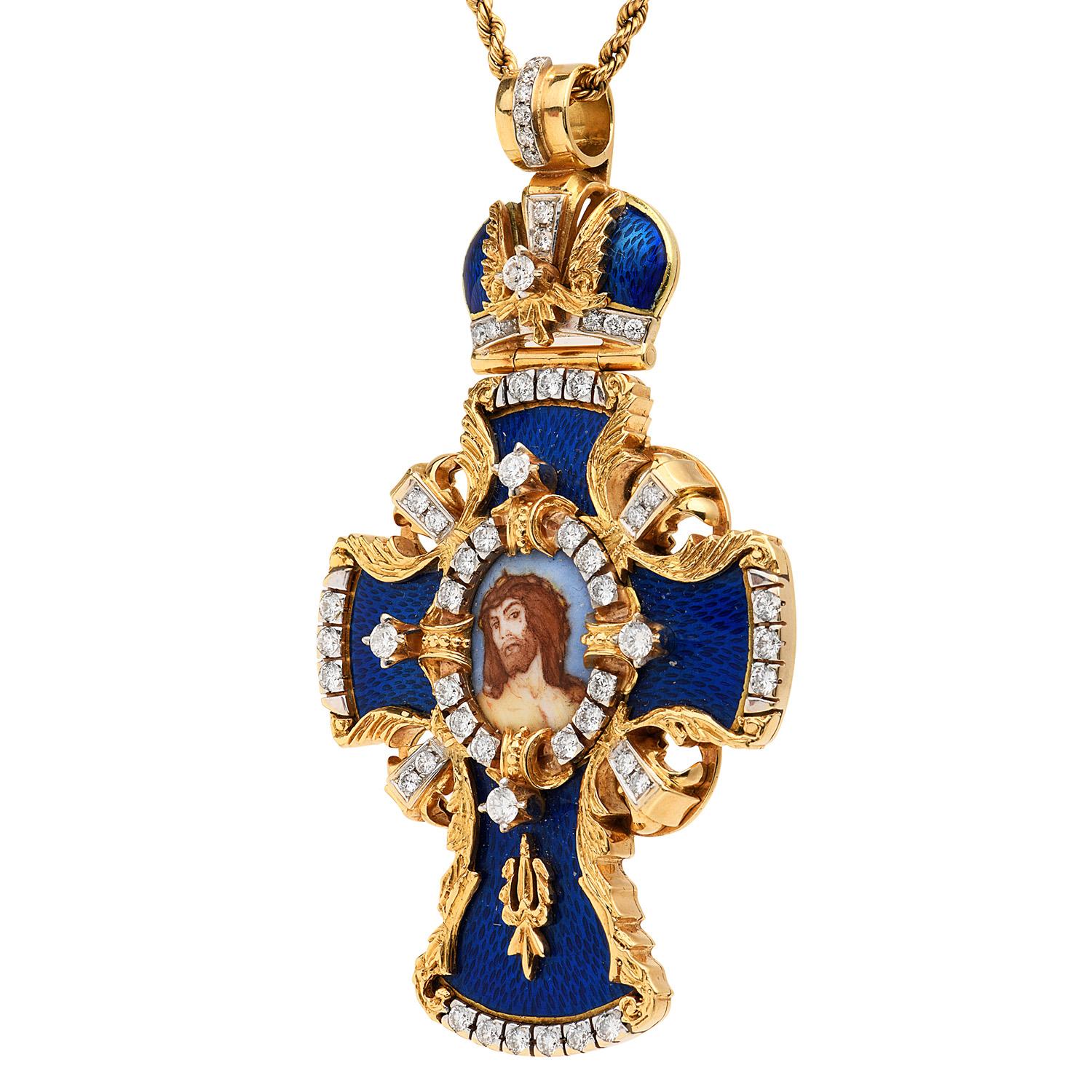 Large exquisite Italian European cross with blue enamel & Jesus Christ, face in the center, adorned by diamonds on a cross-shaped prominent pendant, 

Crafted in solid 18K yellow gold, hand-made, 

Enhanced by (52) round-cut, prong-set, Diamonds