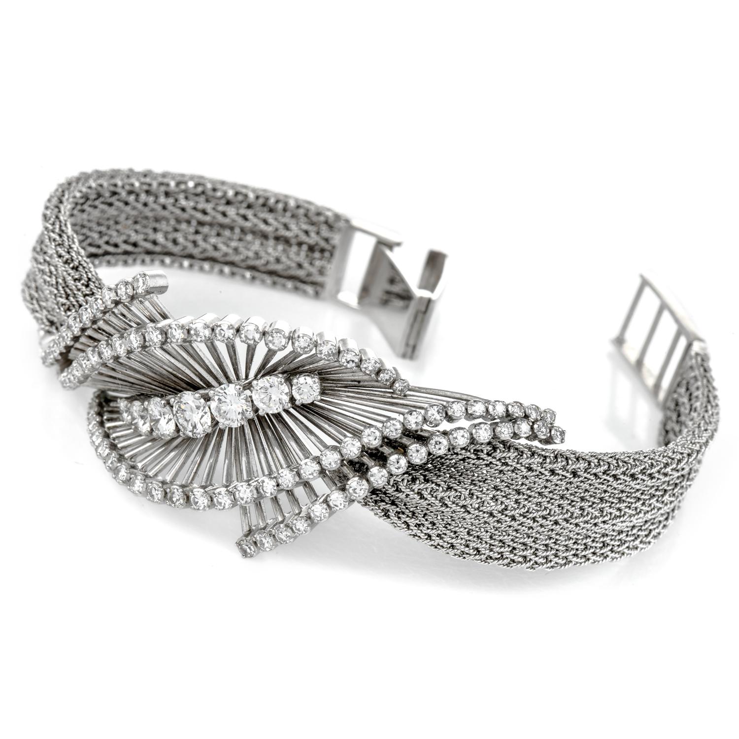 This beautiful vintage Diamond 18K White Gold Bypass Mesh Retro Bracelet is the wild card for any collection.

The edgy design features 92 smaller Round Cut Diamonds, weighing collectively 1.30 graded G-H color and VS1-VS2 clarity.

Centered by 7