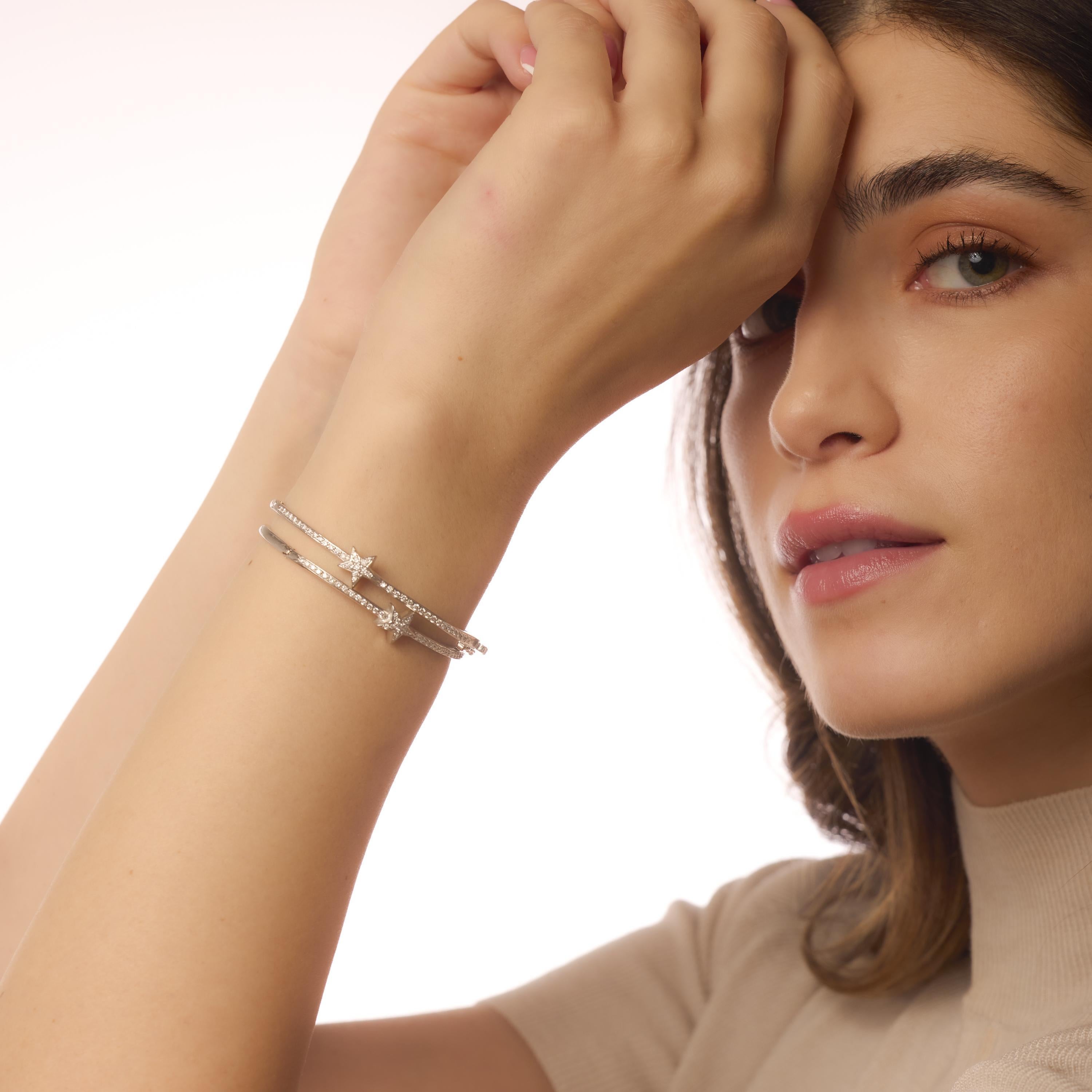 These vintage 18k white gold bangles shimmer with 82 round brilliant diamonds for a refined, elegant touch perfect for layered luxury.