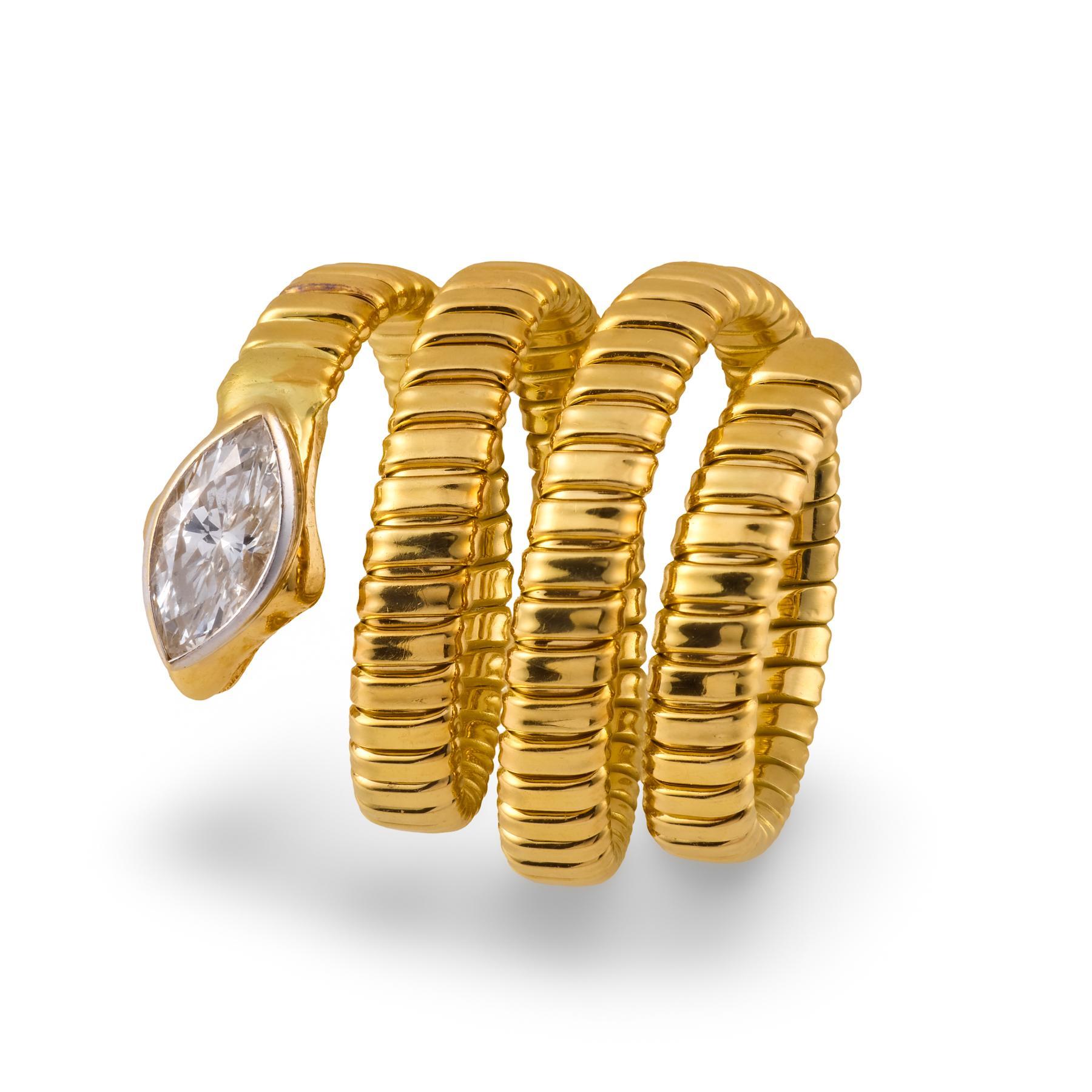 Anello con diamante d
epoca e serpente in oro giallo e bianco 18 ct.
