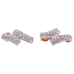 Clous d'oreilles vintage en or et platine 9 carats