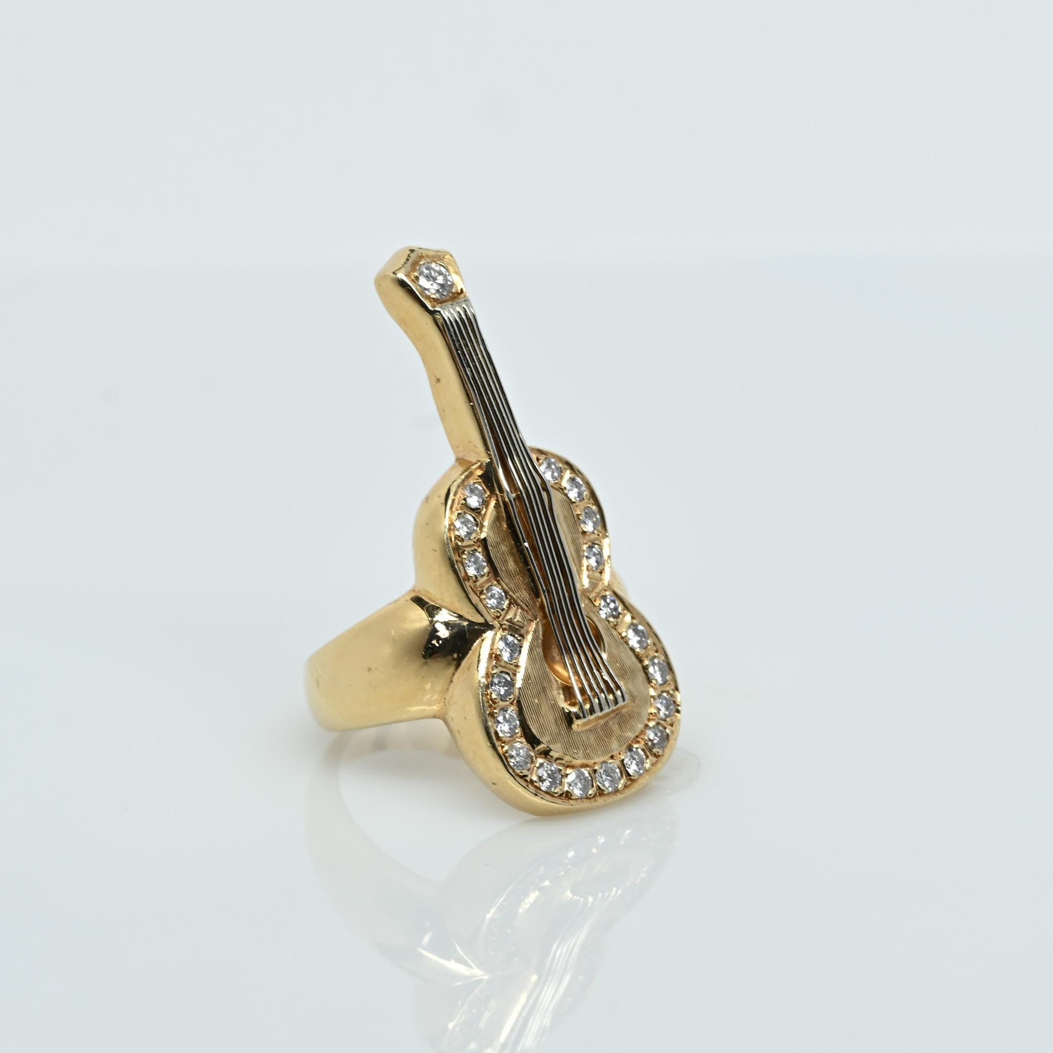 Size: 6.25
Metal Type: 14K Yellow Gold
Weight: 14.71G
Width: 35.6mm to 3.64mm at shank
Finger to Top of Ring: 3.38mm
Hallmarks: 14K

Primary Gem Details: 
Type: Diamond
Quantity: 21
Cut: Round Brilliant
Carat Weight: Aprox 0.65cttw
Color: