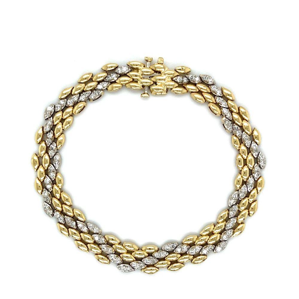  Simply Beautiful! Vintage Luxurious Diamond Gold Link Bracelet. Featuring Diamond-studded 8.75mm Links, alternating between 2 x 1 links with a total Diamond weight of 1.50tcw. Hand crafted 14K Yellow Gold. Measuring approx. 7.75” long for a perfect