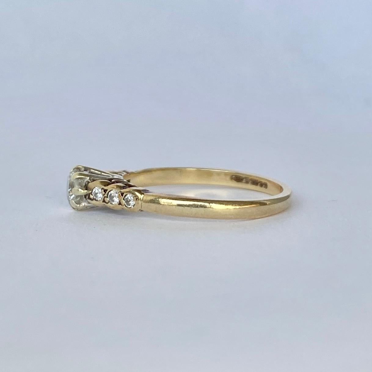 The design of the ring is so simple and beautiful. The central diamond measures 30pts and the shoulders hold diamonds which total 8pts per shoulder. Modelled in 9ct gold and made in Birmingham, England. 

Ring Size: L 1/2 or 6 
Height Off Finger:
