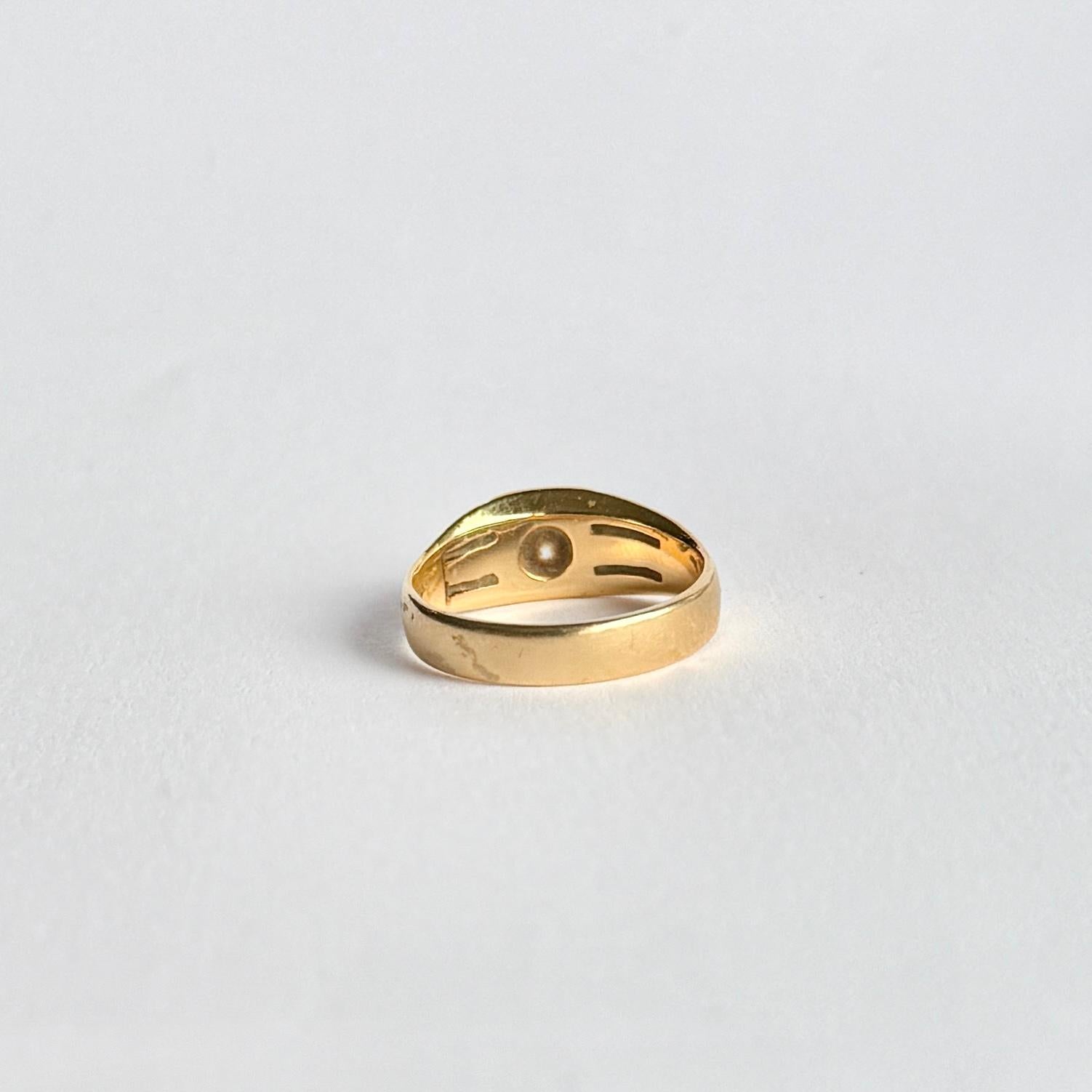 Il design di questo anello è favoloso! La fascia è realizzata in oro 18 carati ed è incastonata con un diamante di 25 carati. 

Misura dell'anello: M 1/2 o 6 1/4
Punto più largo della fascia: 7 mm 

Peso: 4g
