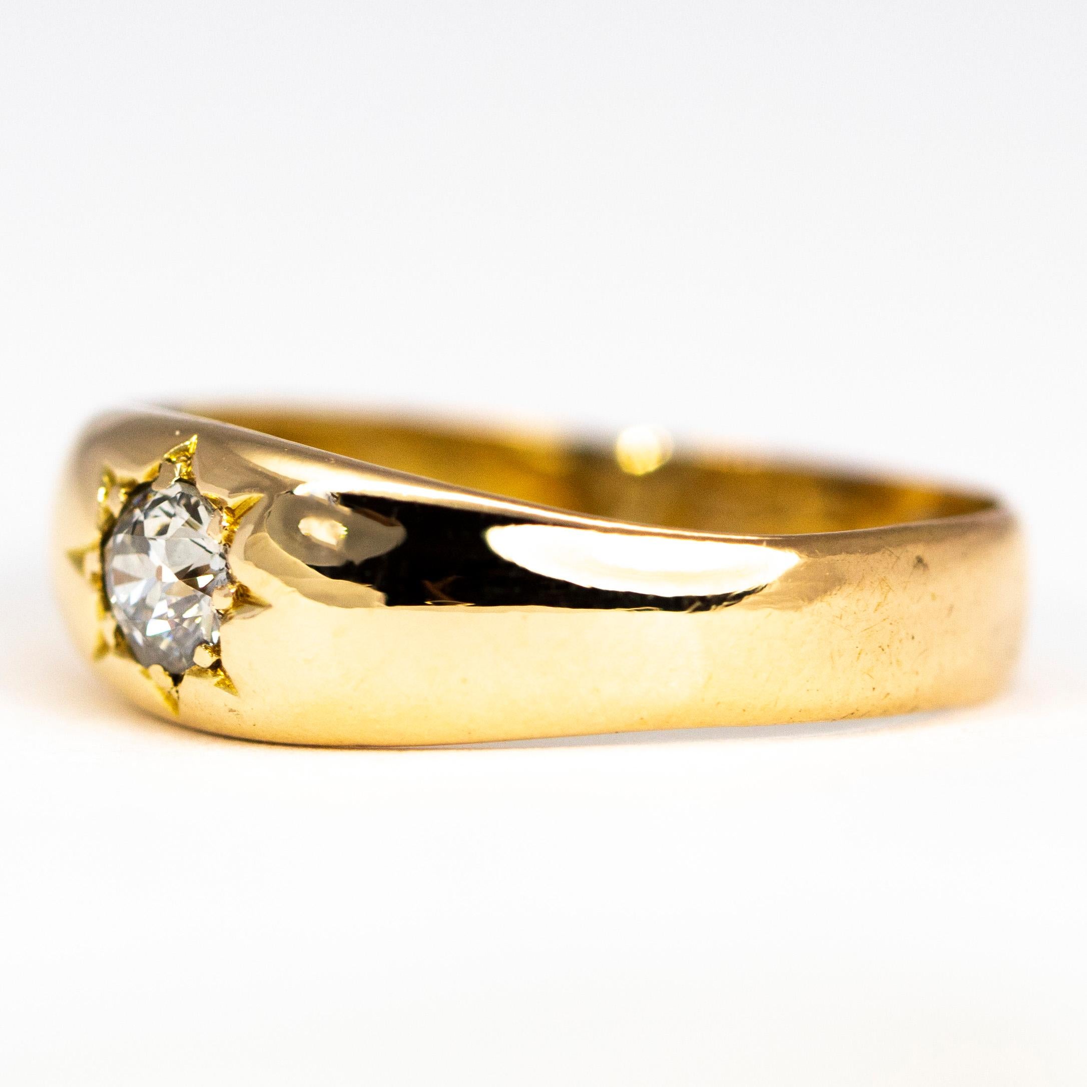 The diamond held in this chunky 19ct gold band measures 25pts and has a wonderful sparkle to it. The band was made in London, England. 

Ring Size: N 1/2 or 7
Width: 6mm

Weight: 3g