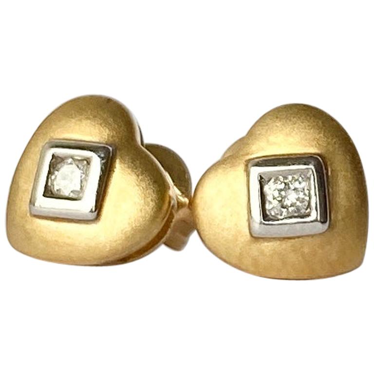 Clous d'oreilles vintage en or 18 carats et diamants