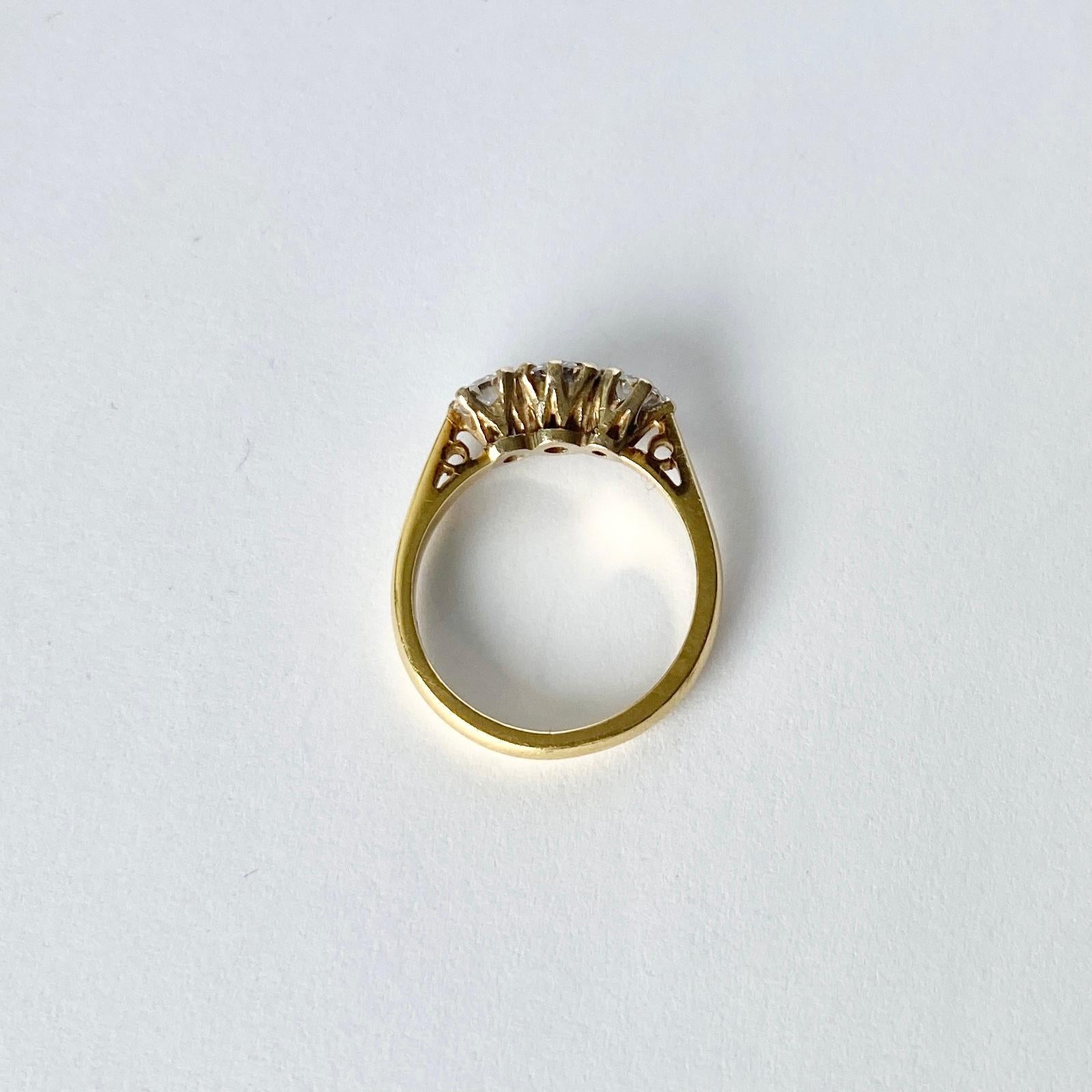 Round Cut Vintage Diamond and 18 Carat Gold Three-Stone Ring