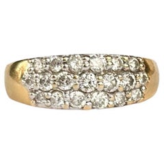 Bague vintage à trois rangées de diamants et or 18 carats
