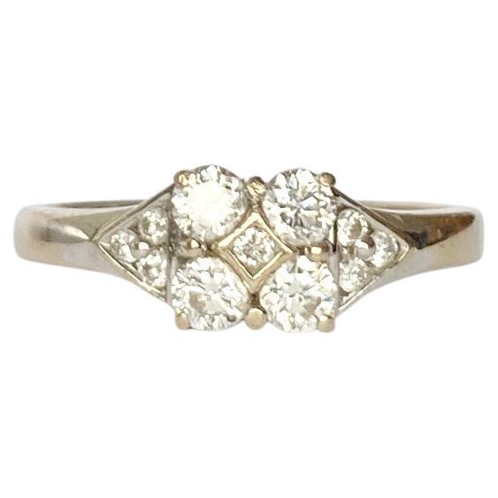 Vintage Diamond and 18 Carat White Gold Four-Stone Ring with Diamond Shoulders For Sale